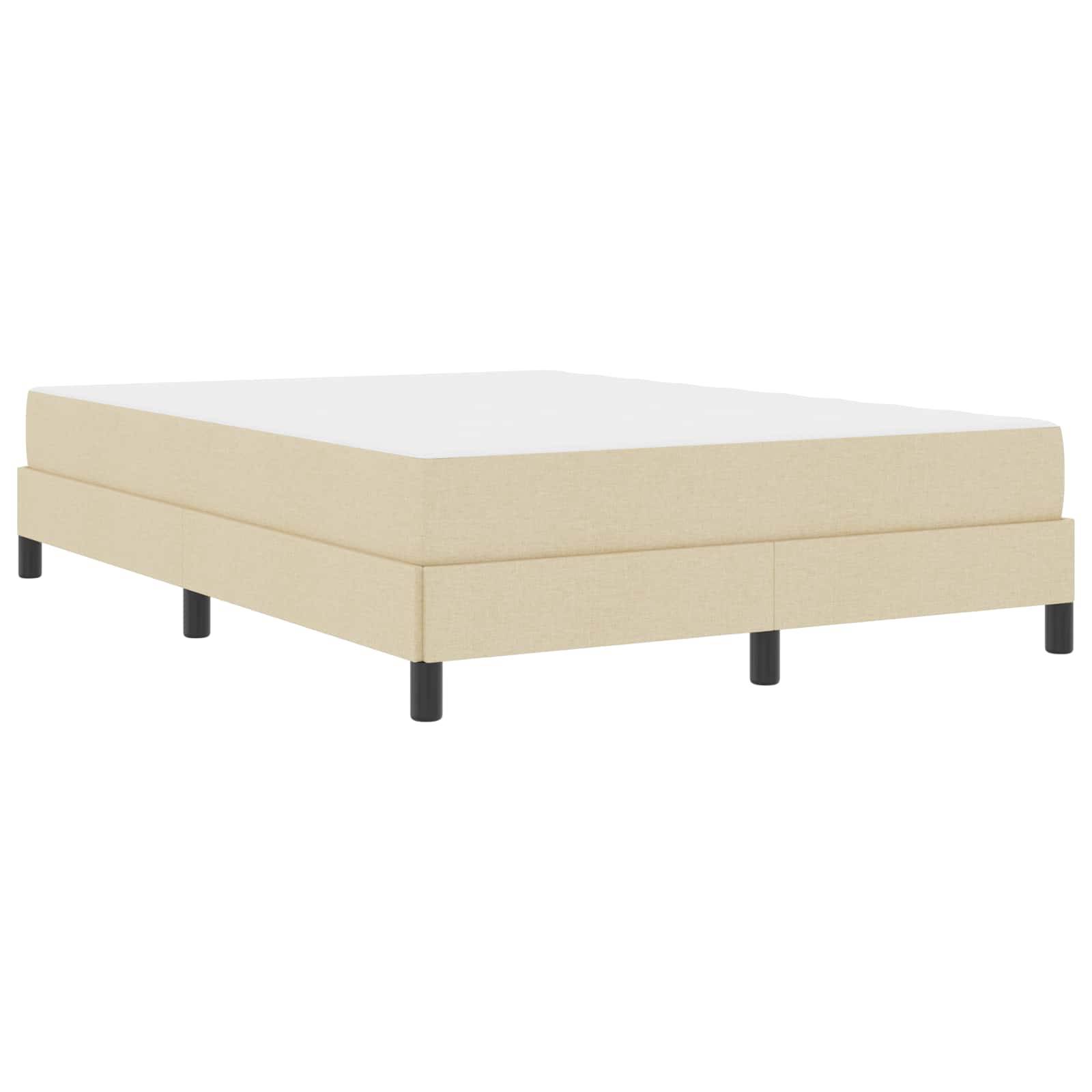 Eine beige Bettbasis mit schwarzen Beinen, konzipiert für eine Matratze. Schlichter und moderner Stil, passend für eine Schlafzimmerumgebung.