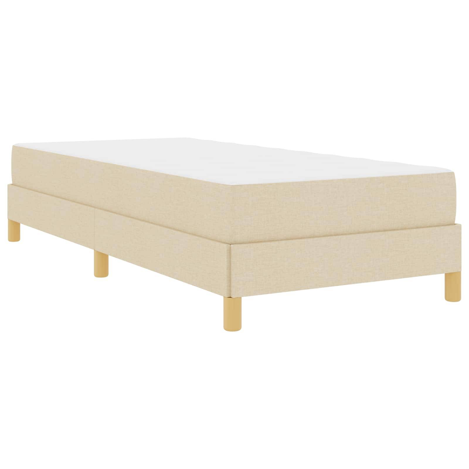 Ein schlichter beiger Bettrahmen mit einer Matratze, ausgestattet mit Holzbeinen. Das Design ist minimalistisch und eignet sich für eine Einzelbettanordnung.