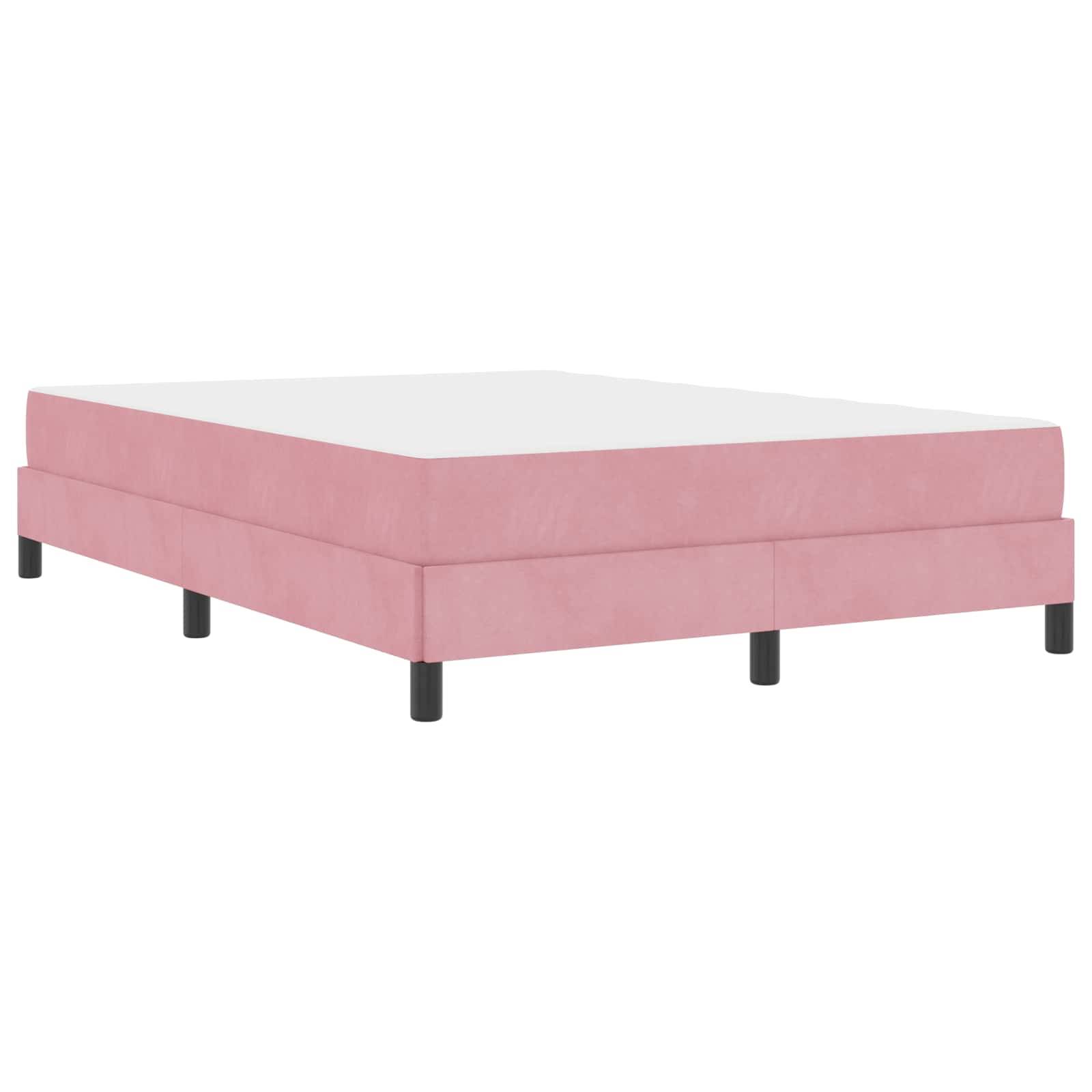 Ein Bettgestell in Rosa mit Polsterung, einem niedrigen Plattformdesign und schwarzen Beinen, ohne Matratze dargestellt.