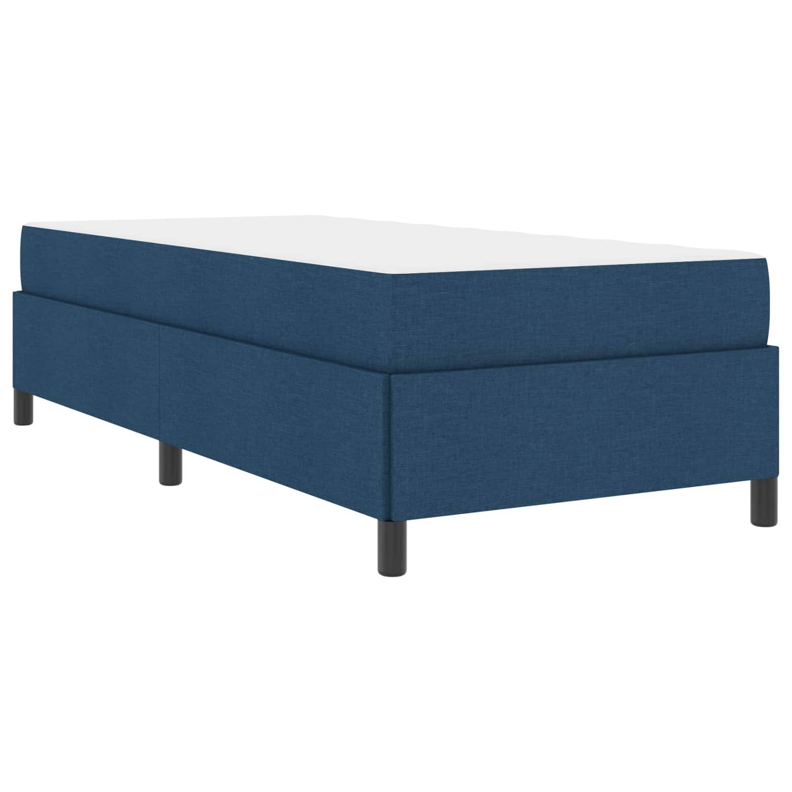 Ein blaues Polstersofabett auf schwarzen Beinen mit einem schlichten, modernen Design.