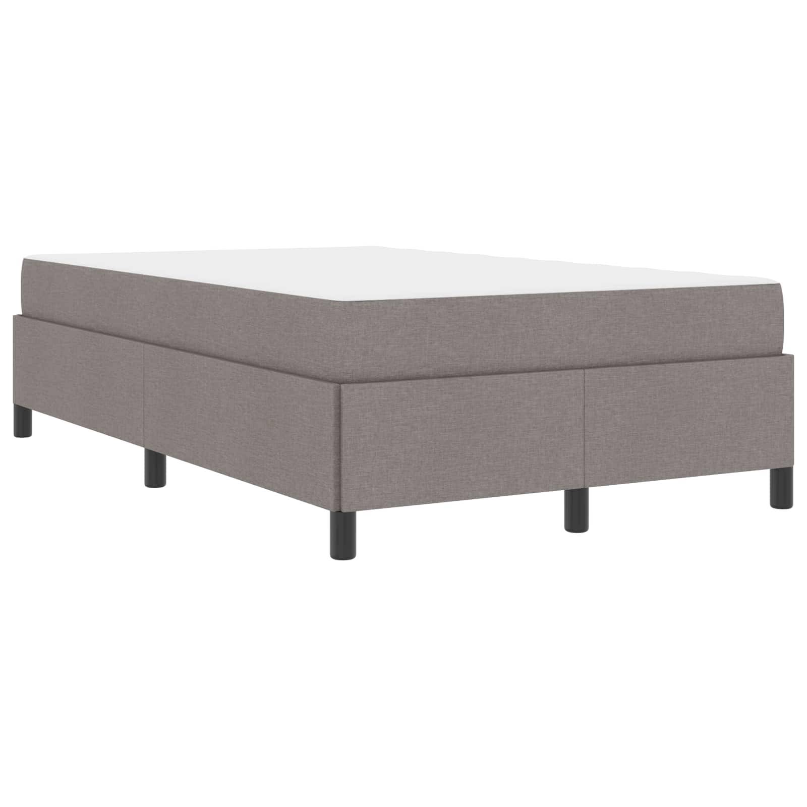 Graues gepolstertes Bettgestell mit minimalistischem Design, ausgestattet mit schwarzen zylindrischen Beinen, passend für moderne Schlafzimmer.