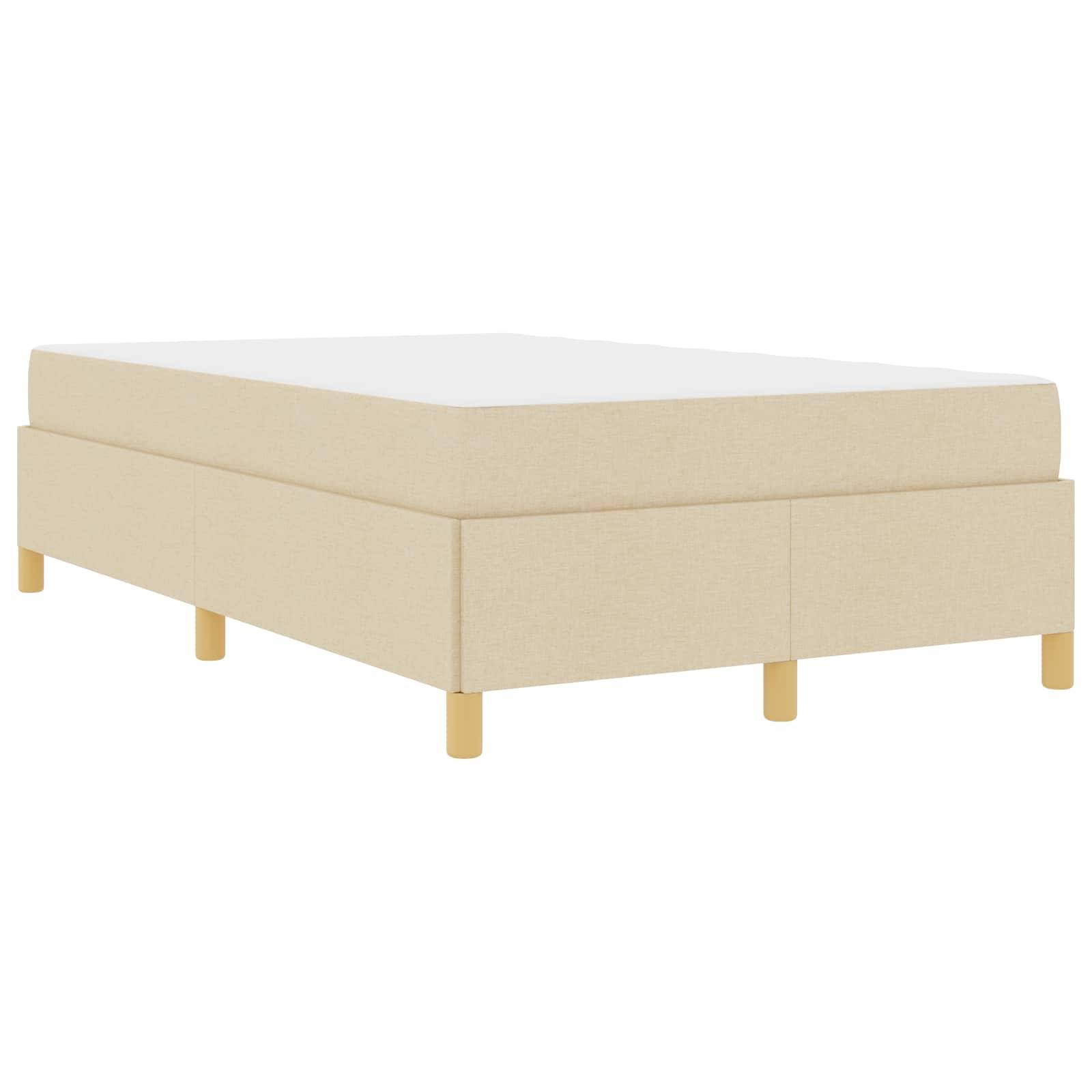 Ein beige gepolstertes Plattformbett mit einer weißen Matratze, das ein minimalistisches Design und Holzbeine aufweist.