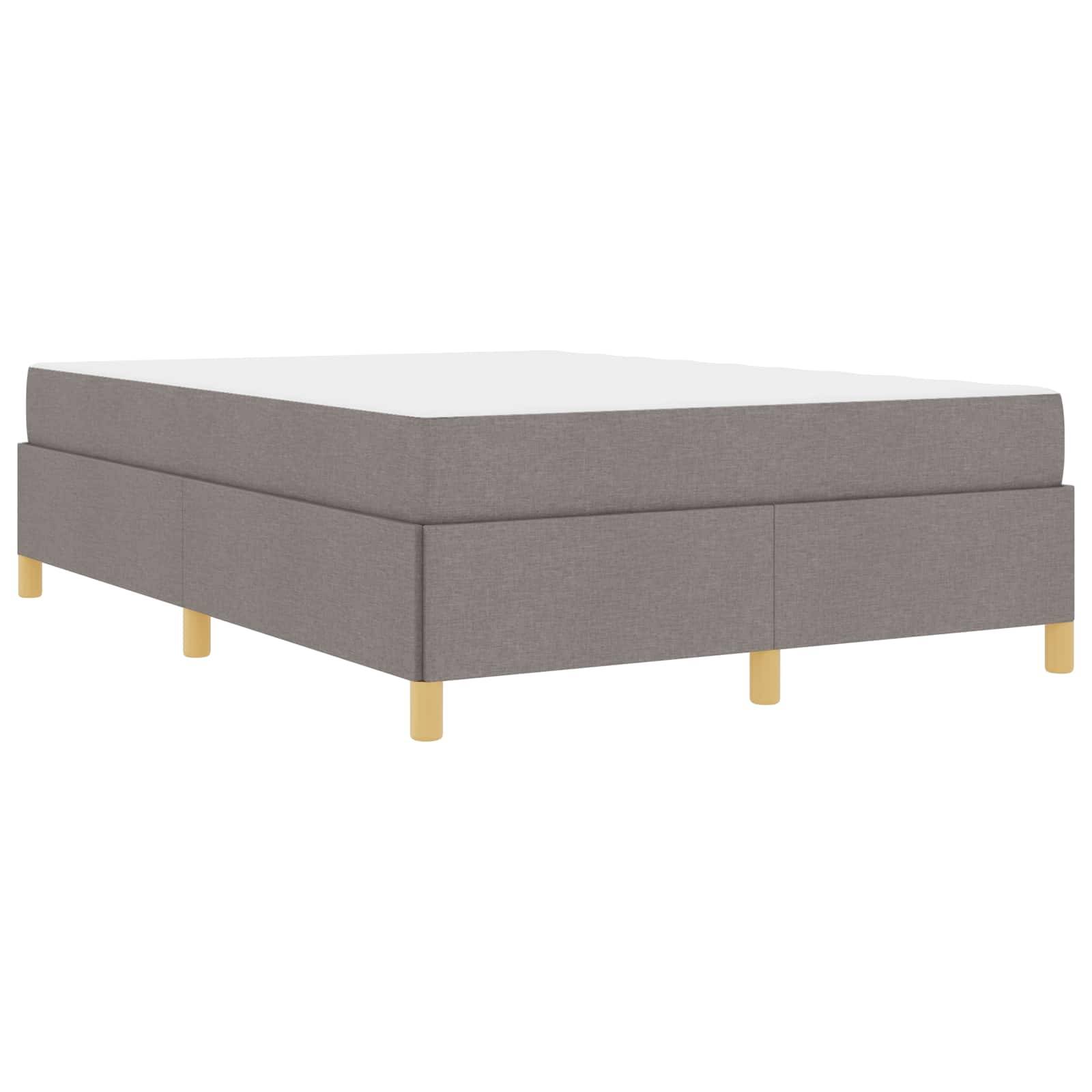 Minimalistischer grauer Bettrahmen mit hellen Holzbeinen, von einem leichten Winkel aus gezeigt, der sein schlichtes und modernes Design hervorhebt.