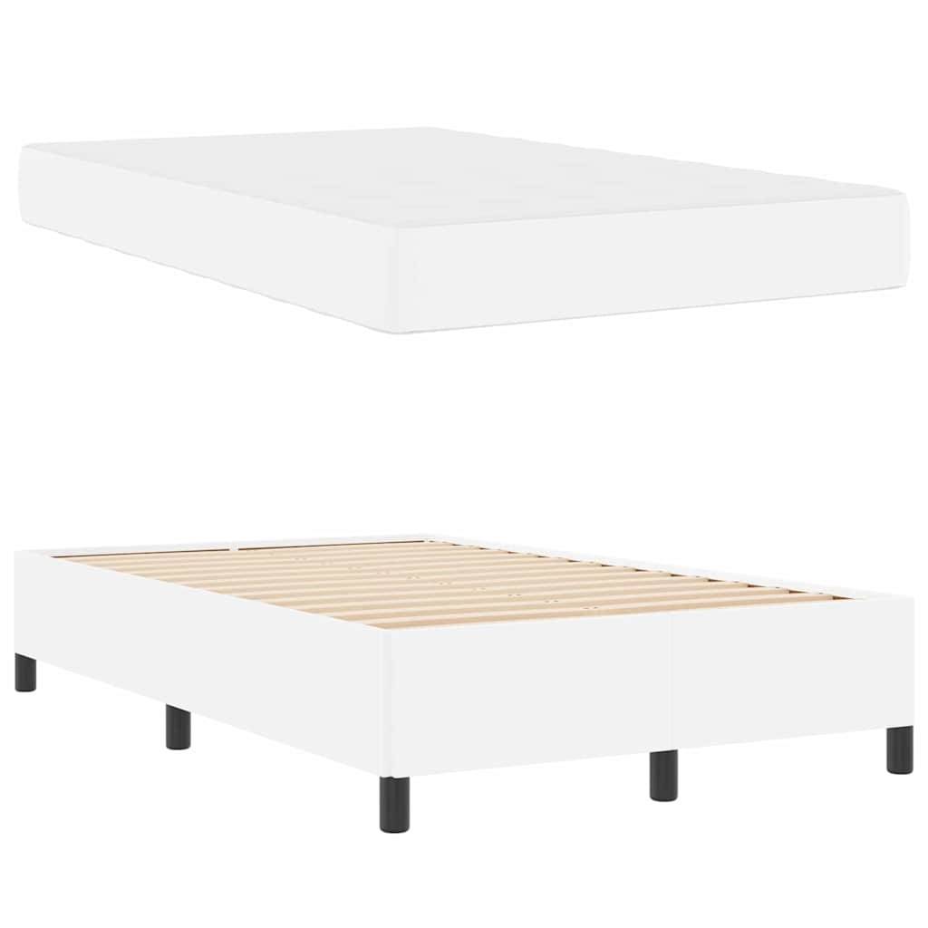 Weißer gepolsterter Bettrahmen mit sechs schwarzen Beinen, gezeigt mit einer passenden Matratze. Schlichtes, modernes Design, geeignet für ein Schlafzimmer.