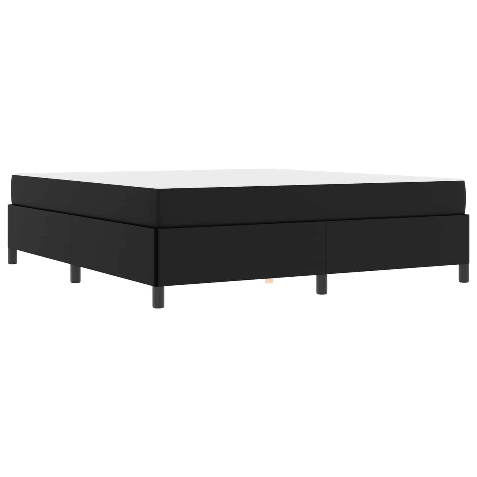 Ein schwarzer, minimalistischer Plattformbettrahmen mit einem flachen Design, charakterisiert durch schlichte Linien und gleichmäßig angeordnete Beine, aufgenommen aus einem Winkel.
