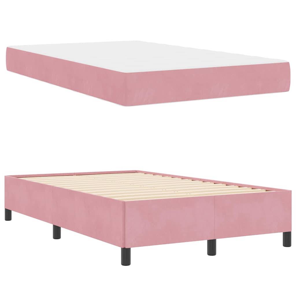 Pinker Stoffbettrahmen, der mit und ohne eine weiße Matratze gezeigt wird. Der Rahmen hat schwarze Beine und Holzlatten zur Matratzenunterstützung.