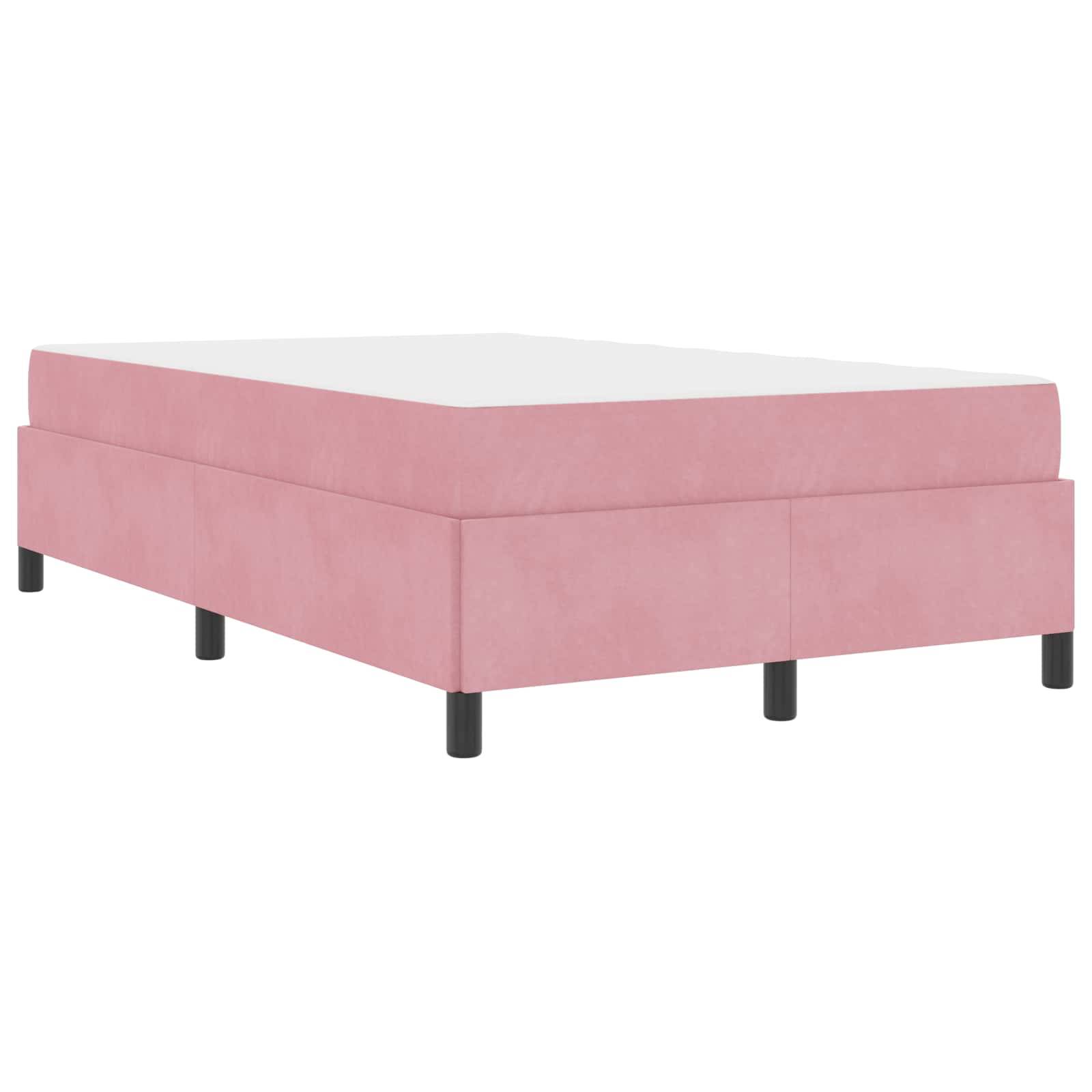 Ein rosa gepolsterter Bettrahmen mit einem einfachen, minimalistischen Design und schwarzen Beinen. Er wird aus einer niedrigen, schrägen Perspektive gezeigt.