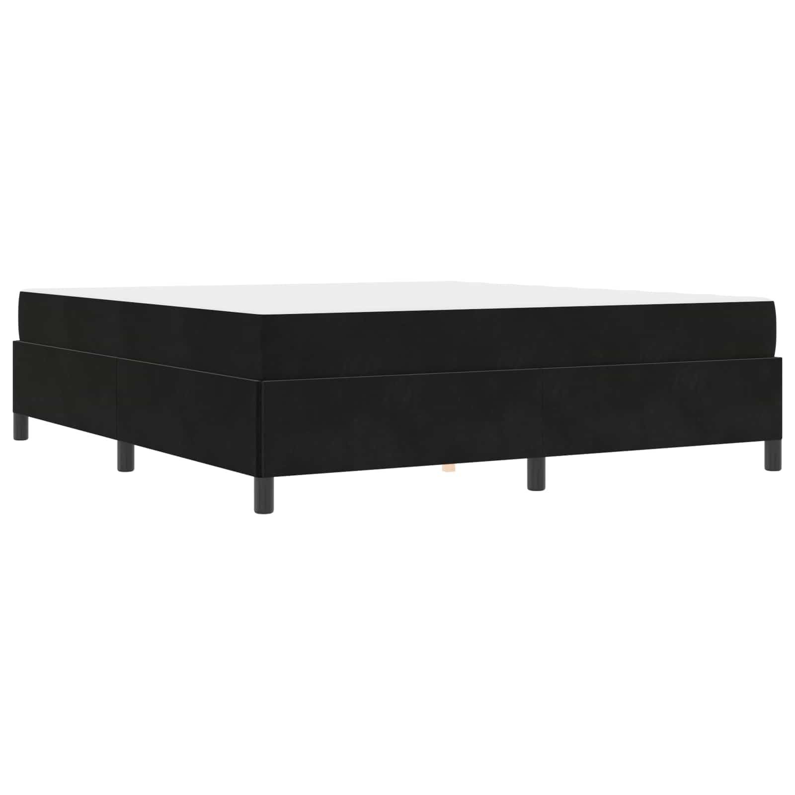 Ein niedriger, schwarzer Bettrahmen mit minimalistischem Design, der auf sechs Beinen ruht und sich perfekt für eine moderne Schlafzimmereinrichtung eignet.