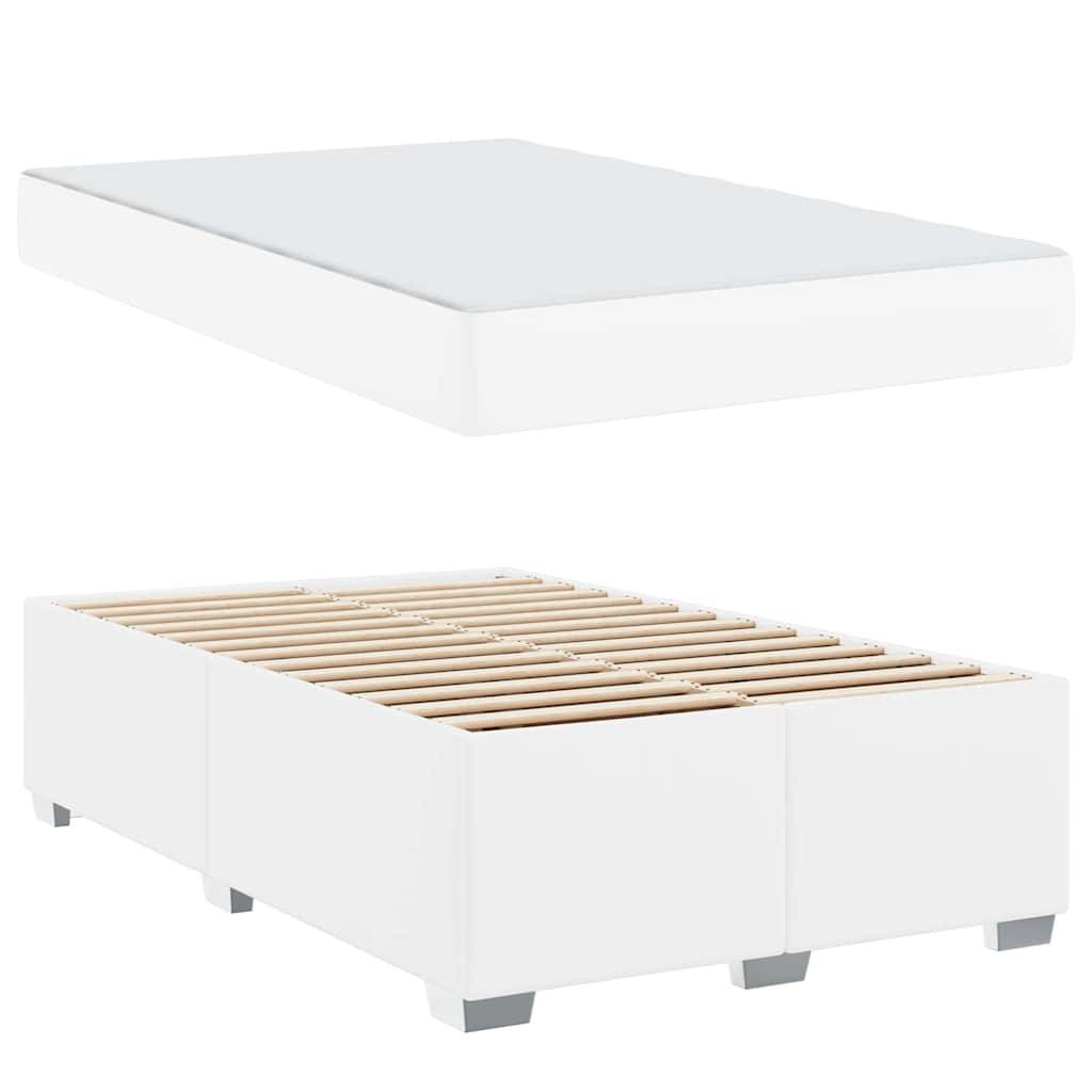 Weißer gepolsterter Bettrahmen mit Holzlatten und abgenommenem Matratze, in minimalistischem Stil dargestellt, vor einem schlichten Hintergrund.
