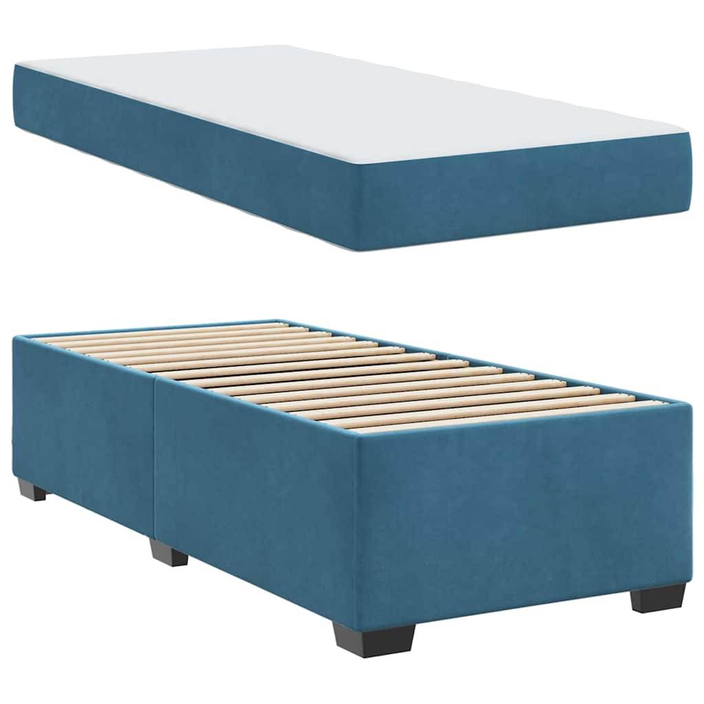 Blaue Plattformbettgestell und Matratze. Bild zeigt ein blau gepolstertes Plattformbettgestell mit Holzlatten und eine passende Matratze obenauf.