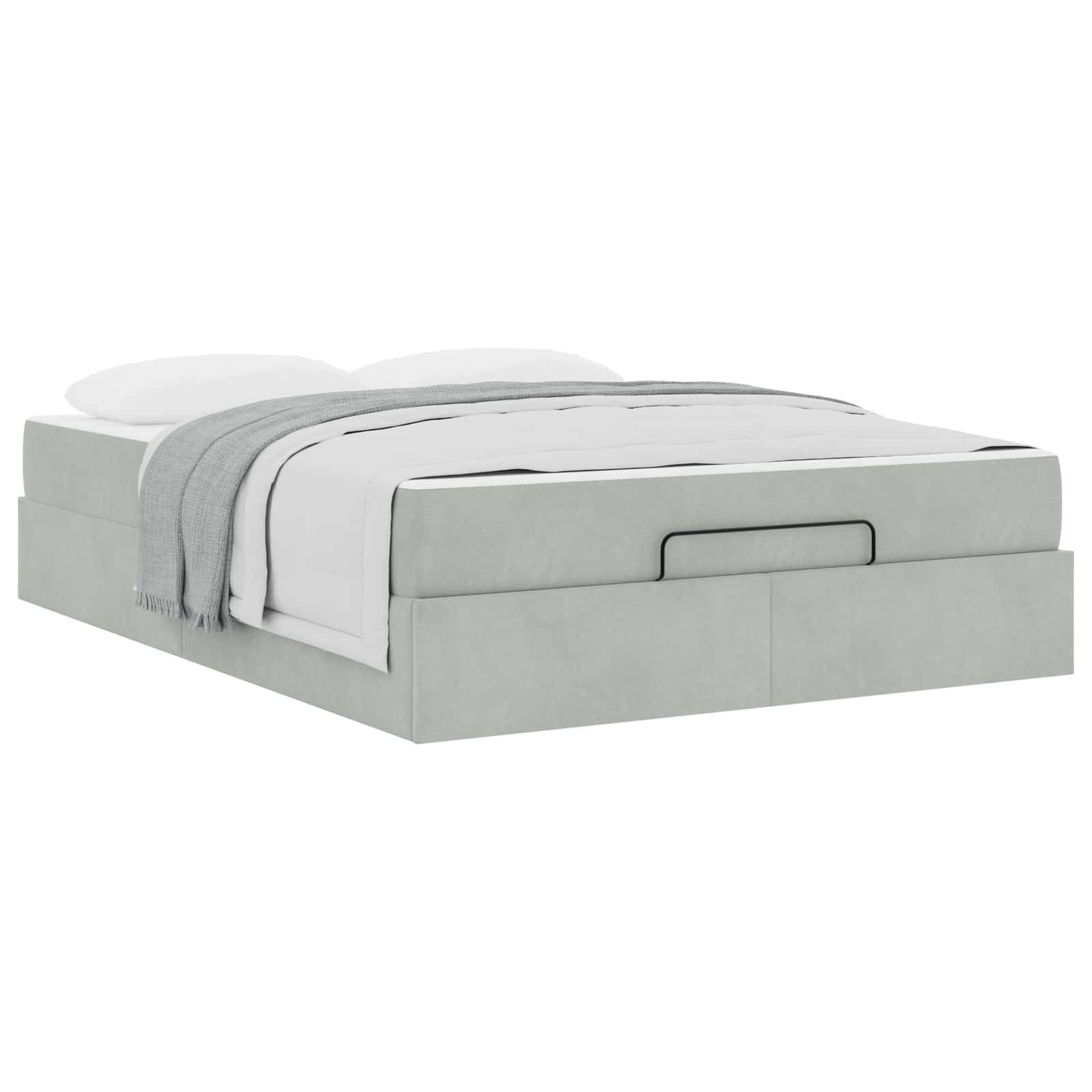 Ein grau gepolstertes Bett mit einer weißen Matratze, Kissen und einer zusammengelegten grauen Decke. Zwei Lagerschubladen sind in die Bettsockelstruktur integriert.