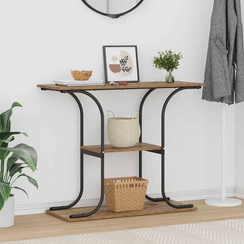 Moderne Flurkonsolentisch mit Holzregalen und schwarzem Metallrahmen, die Dekoration, einen Korb und eine Pflanze neben einer Garderobe und einer Zimmerpflanze halten.
