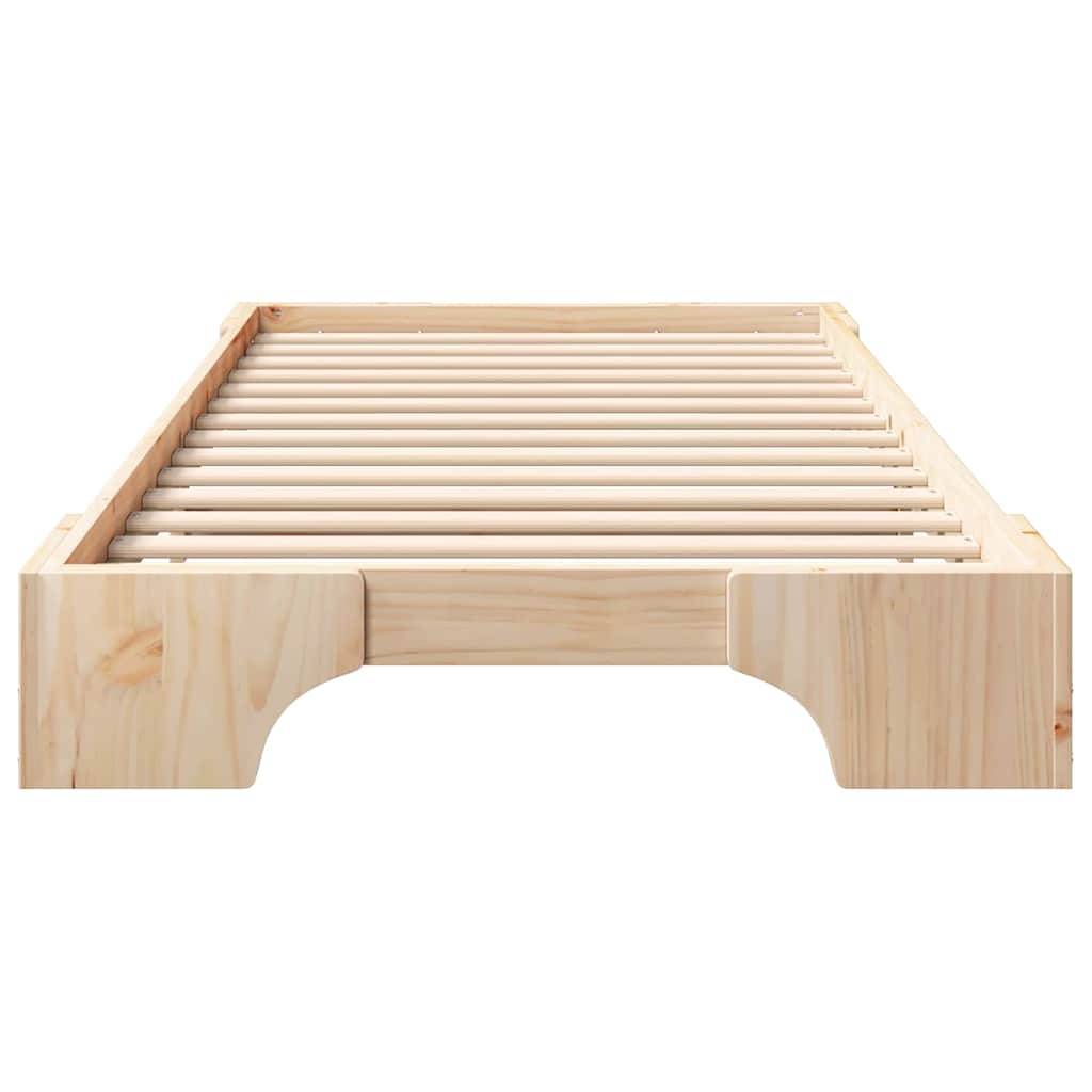 Ein Bettgestell aus Holz mit minimalistischem Design, das horizontale Latten zur Matratzenunterstützung aufweist.