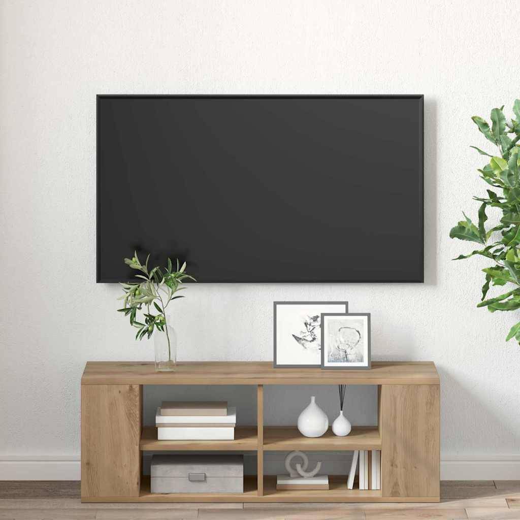 Ein moderner Wohnbereich mit einem an der Wand montierten Flachbild-Fernseher über einem Holz-Medienschrank. Zwei Pflanzen und gerahmte Bilder schmücken den Schrank.