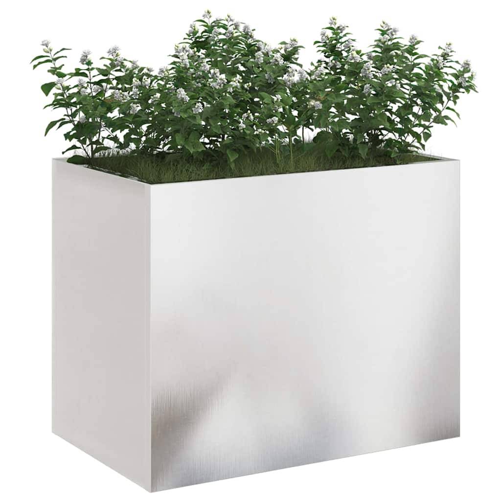 Eine elegante, rechteckige Pflanzbox in Metallic-Optik, gefüllt mit grünem Blattwerk, die ein modernes Gartendesign präsentiert.