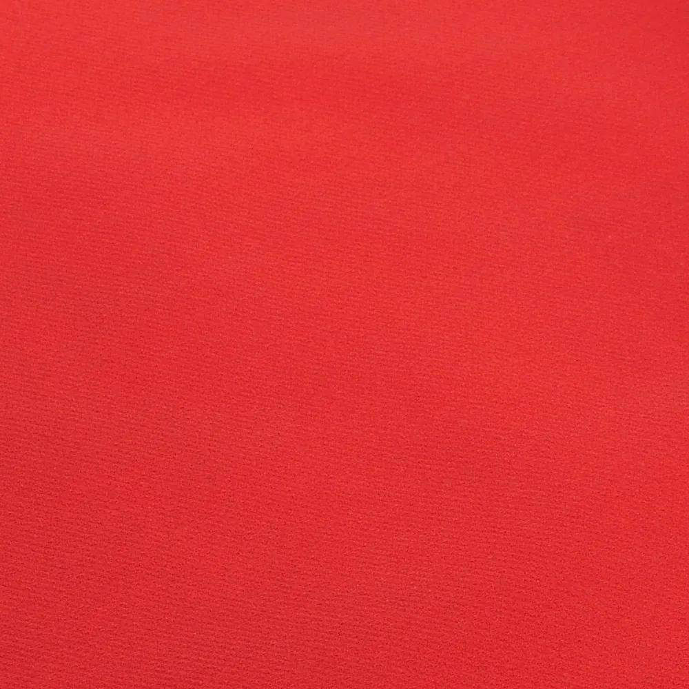 Ein lebendiger roter Stoff mit einer gleichmäßigen Textur, der ein kühnes und einheitliches Aussehen bietet.