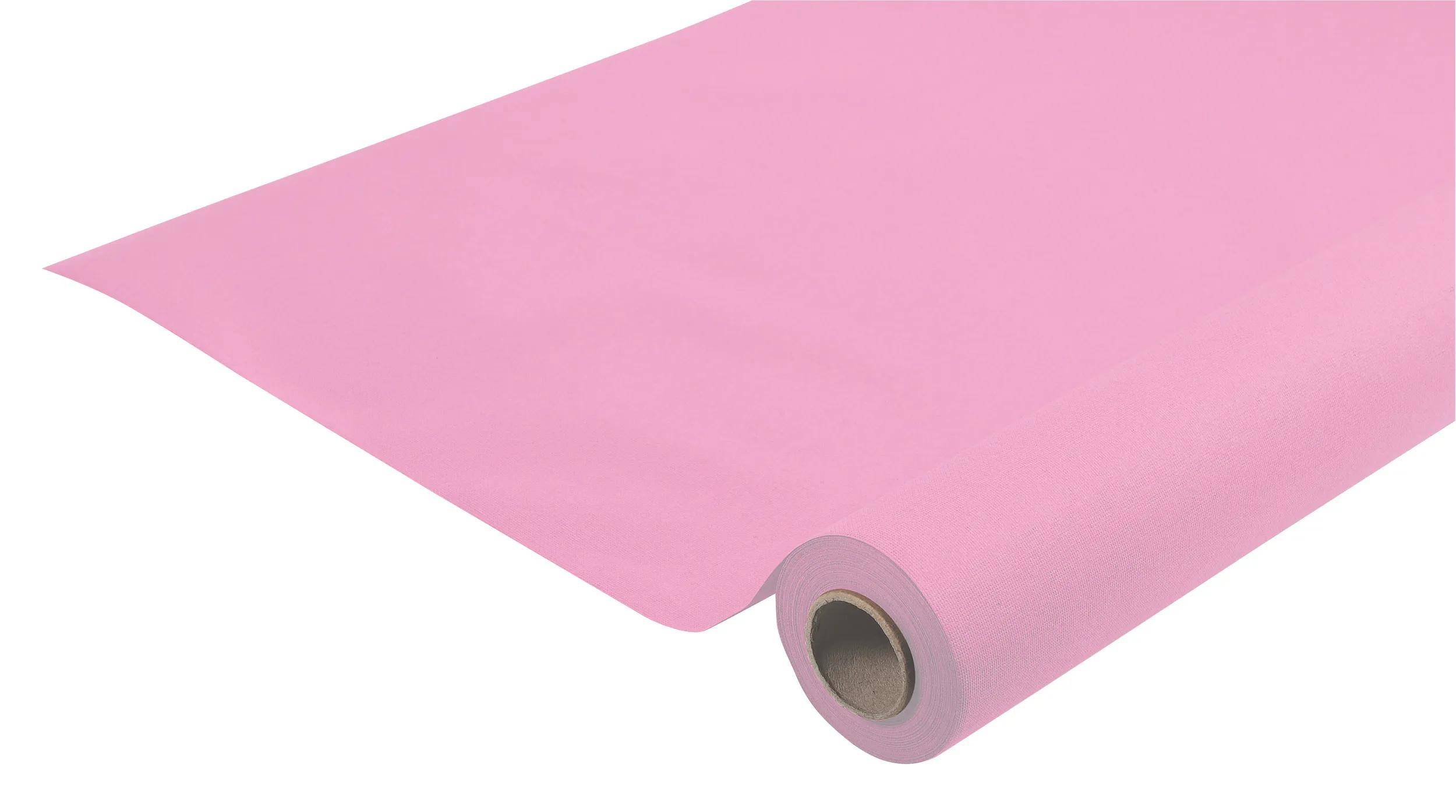 Eine Rolle rosa Geschenkpapier, die auf weißem Hintergrund teilweise abgerollt ist und sowohl das Papier als auch das hohle Innere der Rolle zeigt.