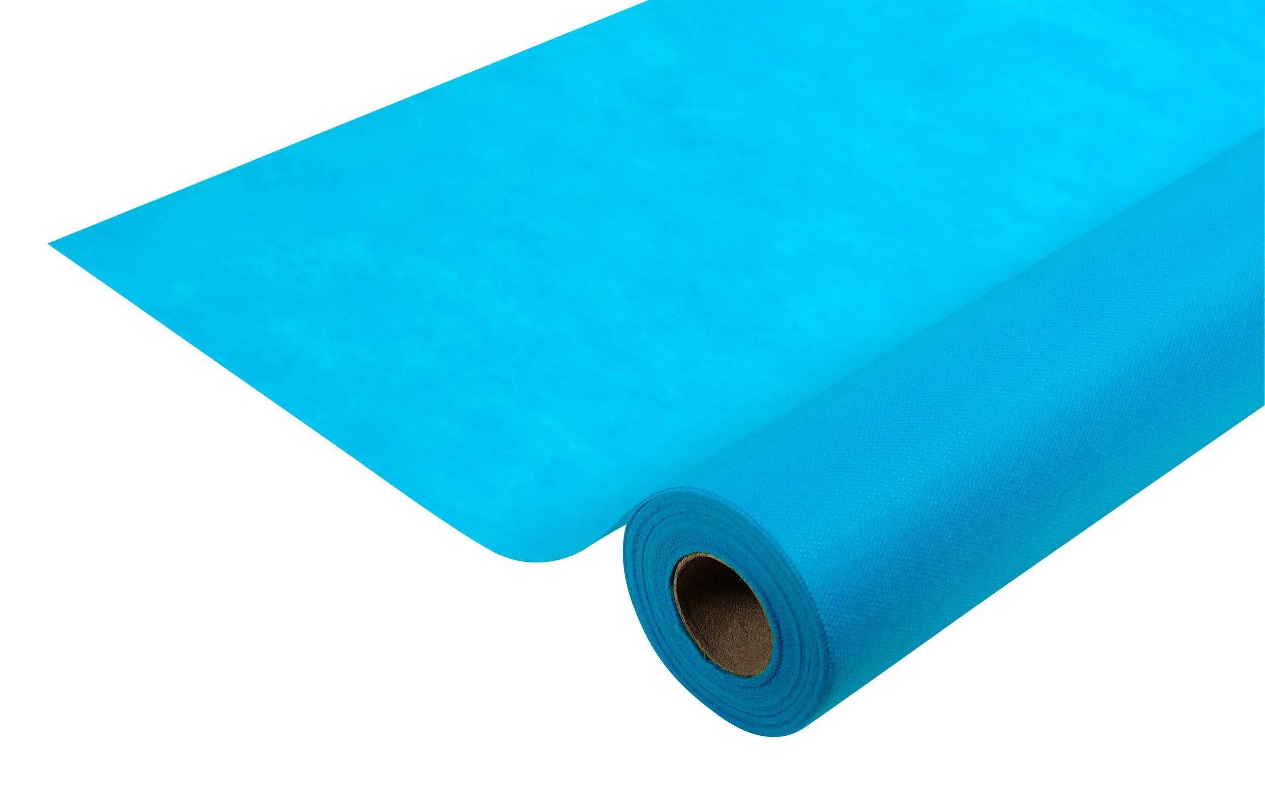 Eine Rolle hellblaues Papier entrollt sich teilweise und offenbart ihre Textur und Dicke.