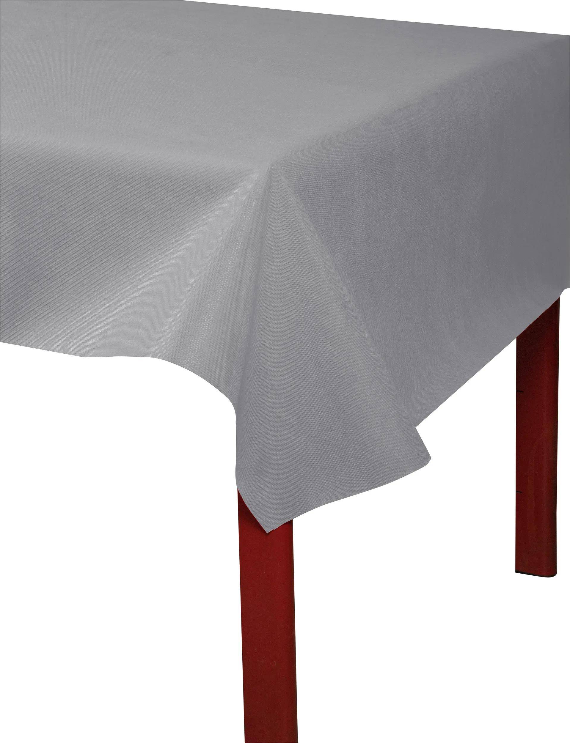 Ein roter Tisch, teilweise mit einer schlichten weißen Tischdecke bedeckt.