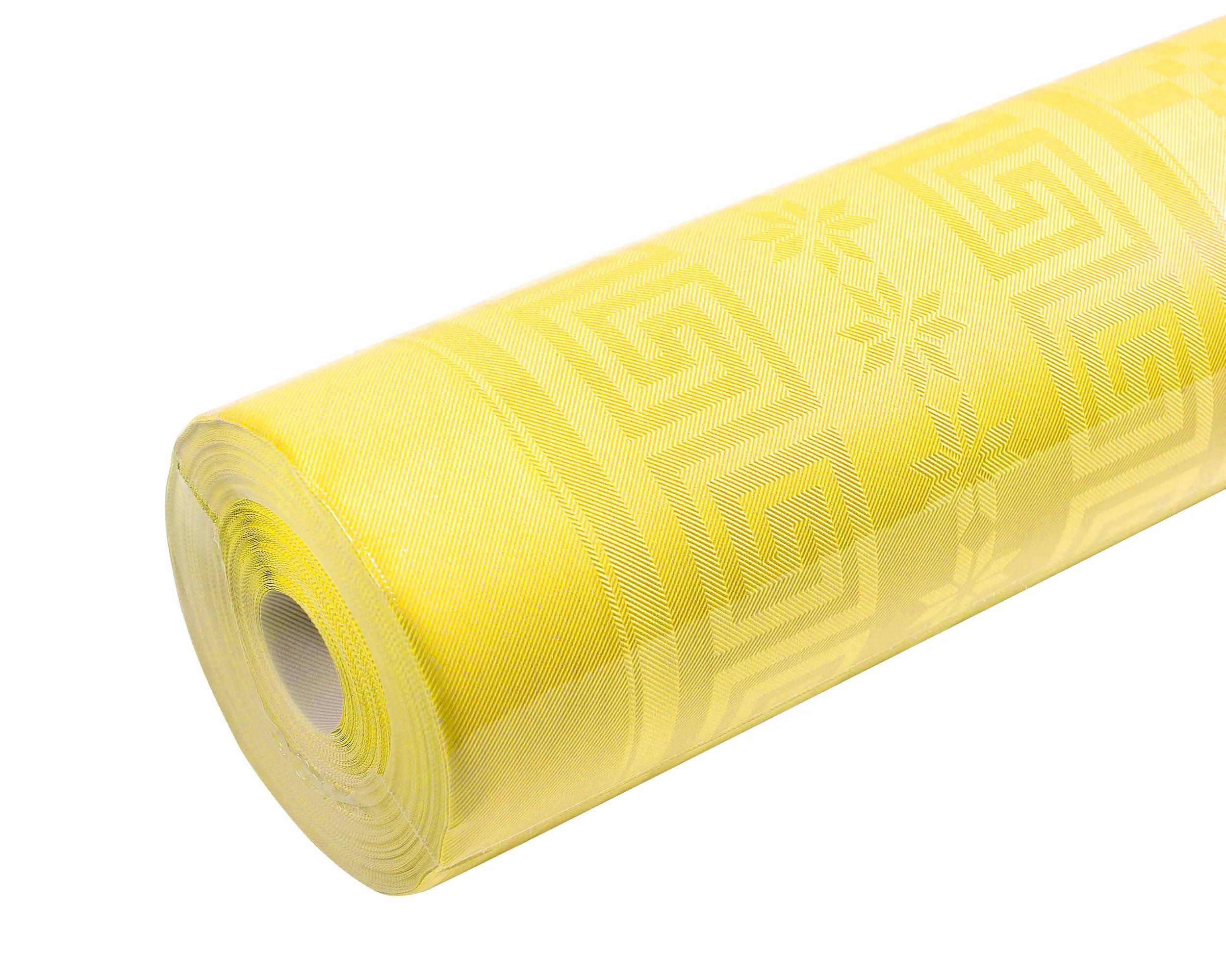 Eine Rolle gelben Stoff mit geometrischen und floralen Mustern, geeignet für Näh- oder Handwerksprojekte.