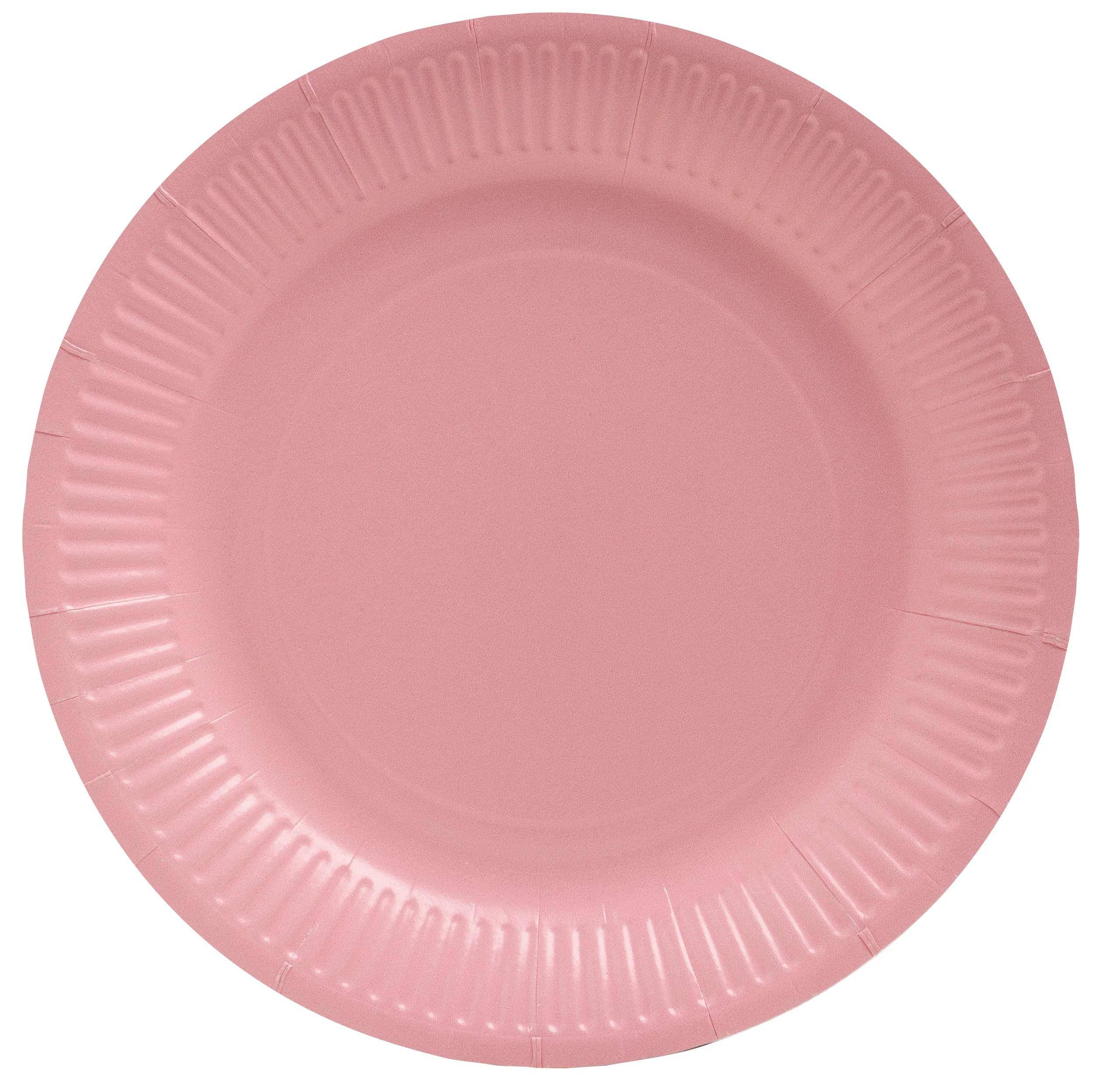 Ein rosa Papierteller mit einer wellenförmigen Randgestaltung, von oben gezeigt.
