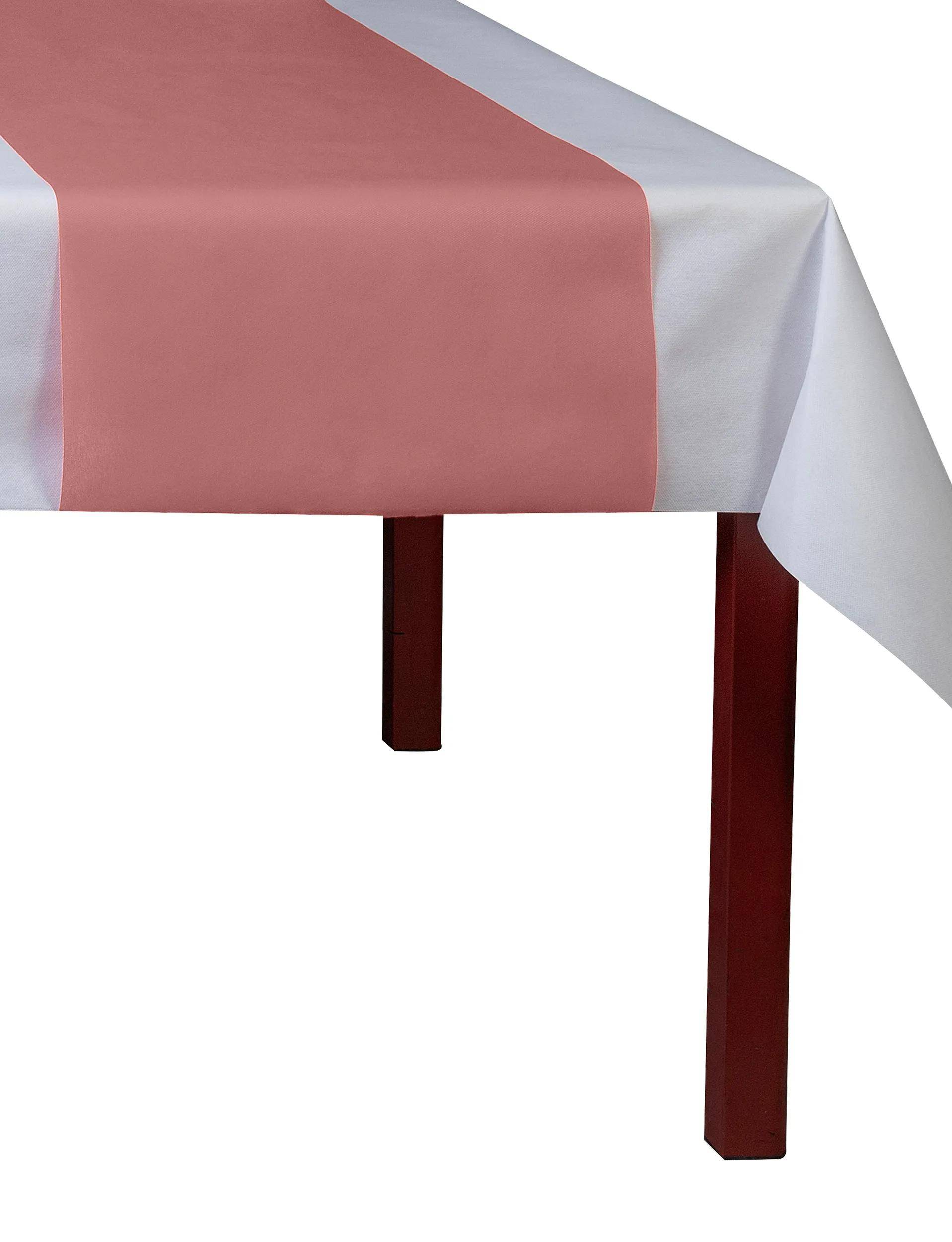 Ein Tisch mit einem rosa Tischläufer über einer weißen Tischdecke. Der Tisch hat rote Beine.