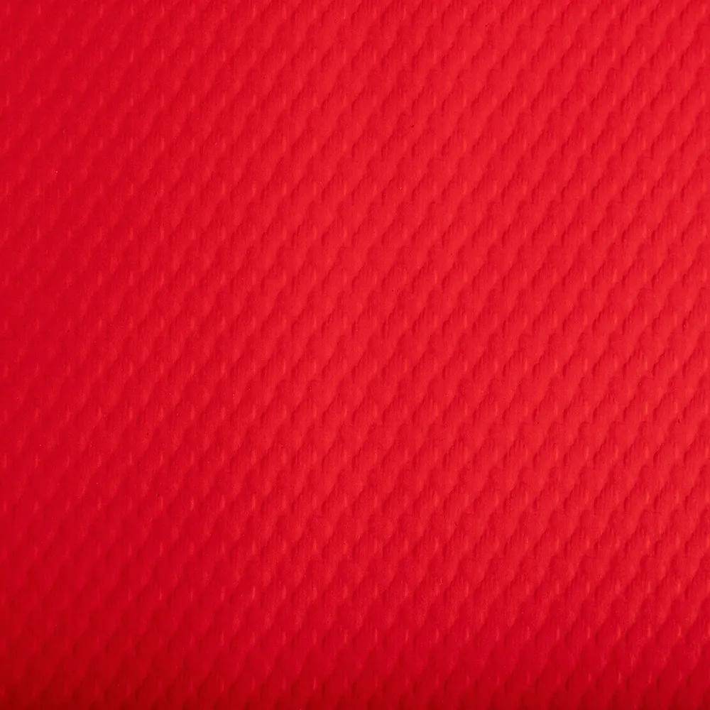 Rote Oberfläche mit Textur und subtildem Diamantmuster.