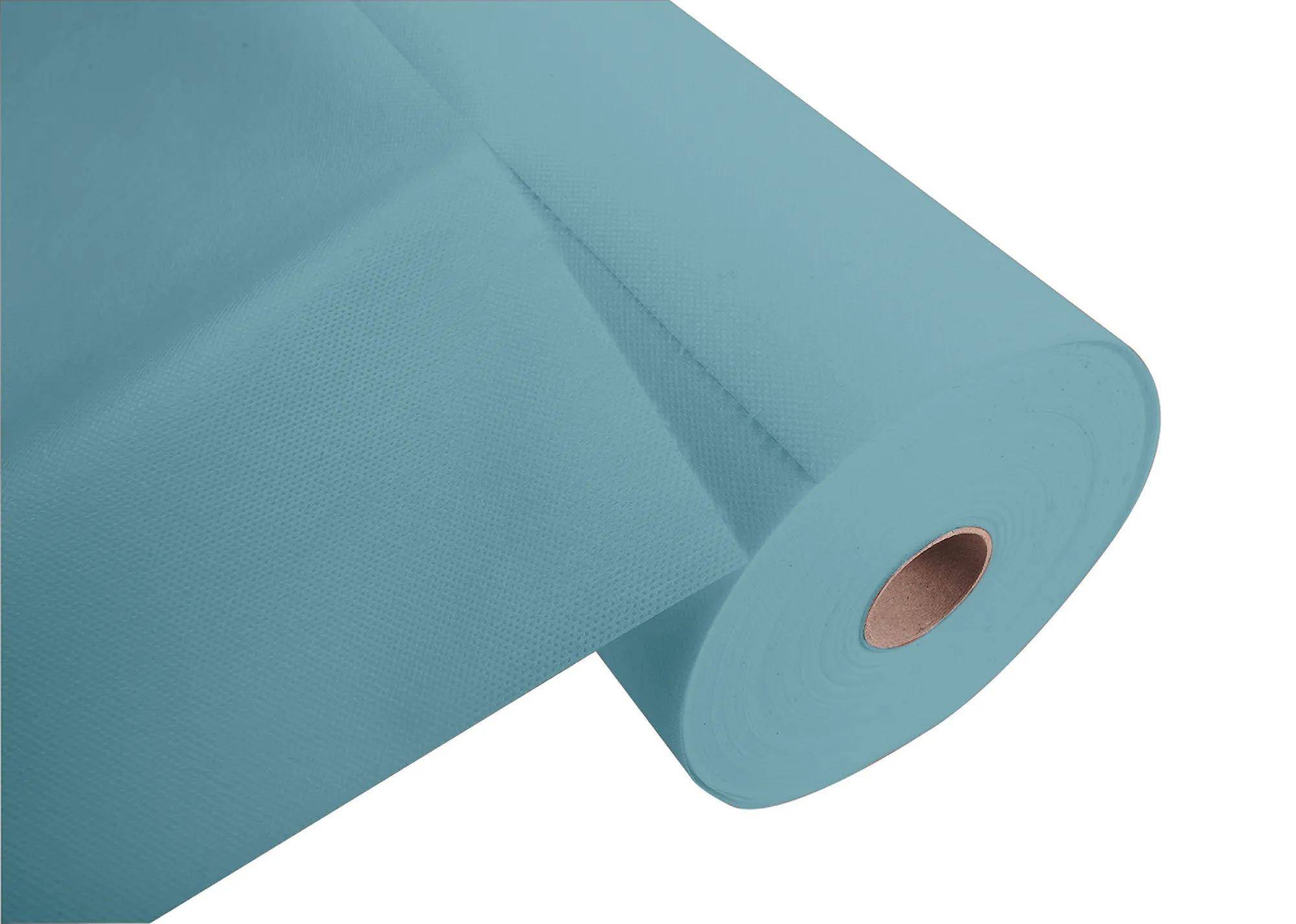 Rolle aus hellblauem Vliesstoff, teilweise abgerollt, mit glatter Textur, geeignet für Handwerk oder industrielle Verwendung.
