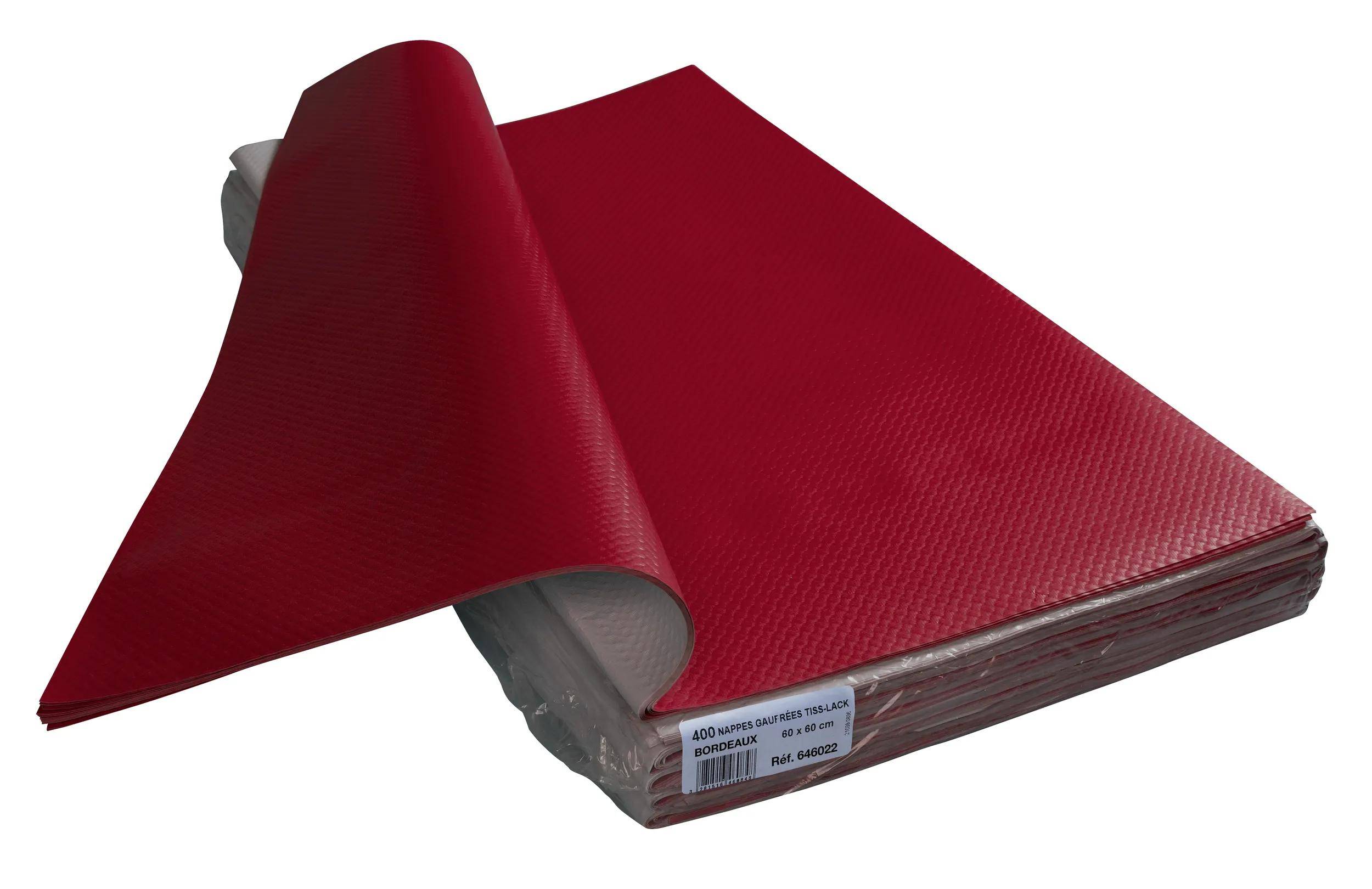 Ein Stapel roter strukturierter Papiere mit einem teilweise angehobenen Blatt, gekennzeichnet mit „400 Nappes 84x84