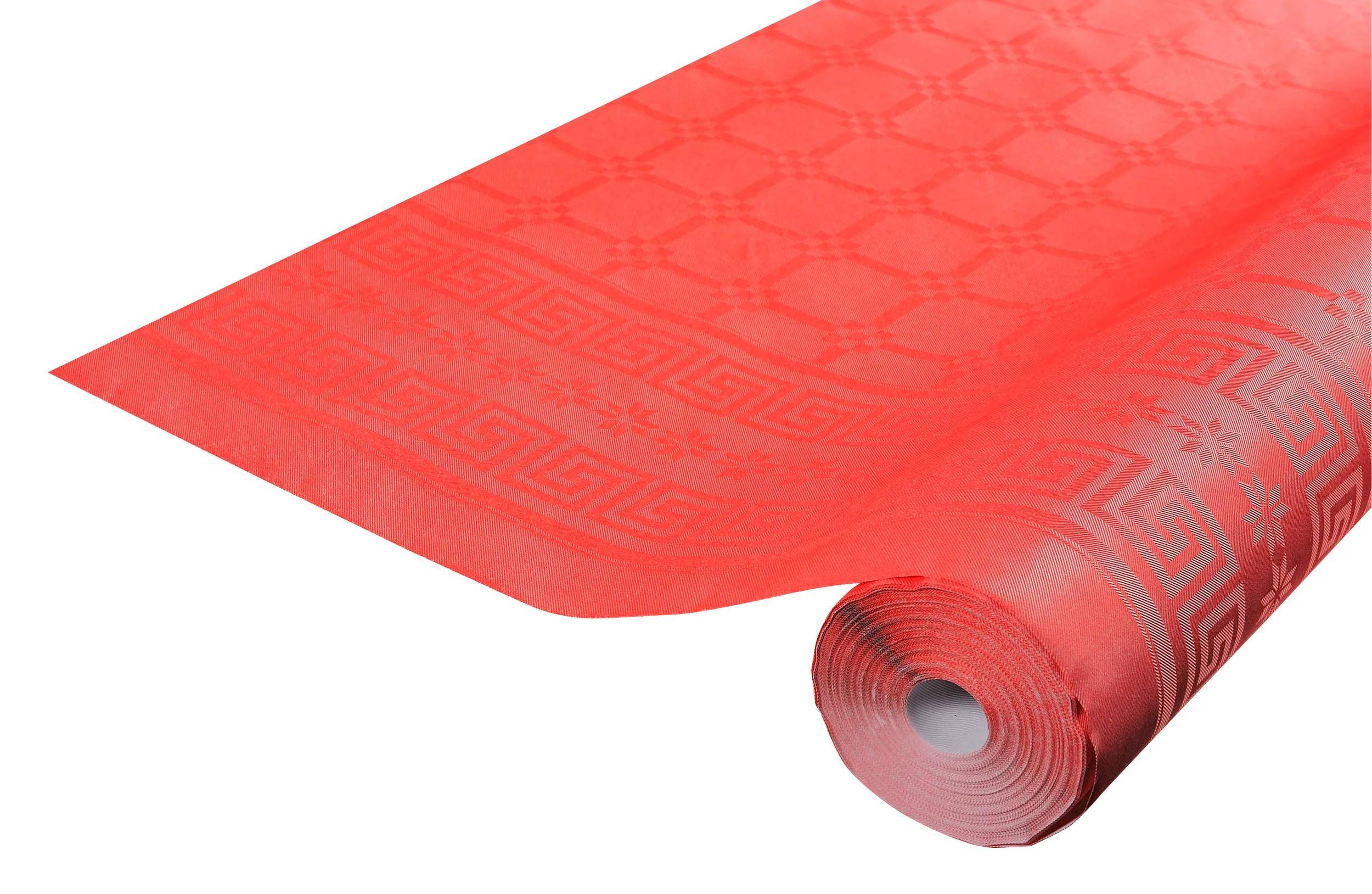 Eine Rolle rote Tischdecke mit geometrischem Muster, teilweise ausgerollt, die aufwendige Details und eine lebendige Farbe zeigt.