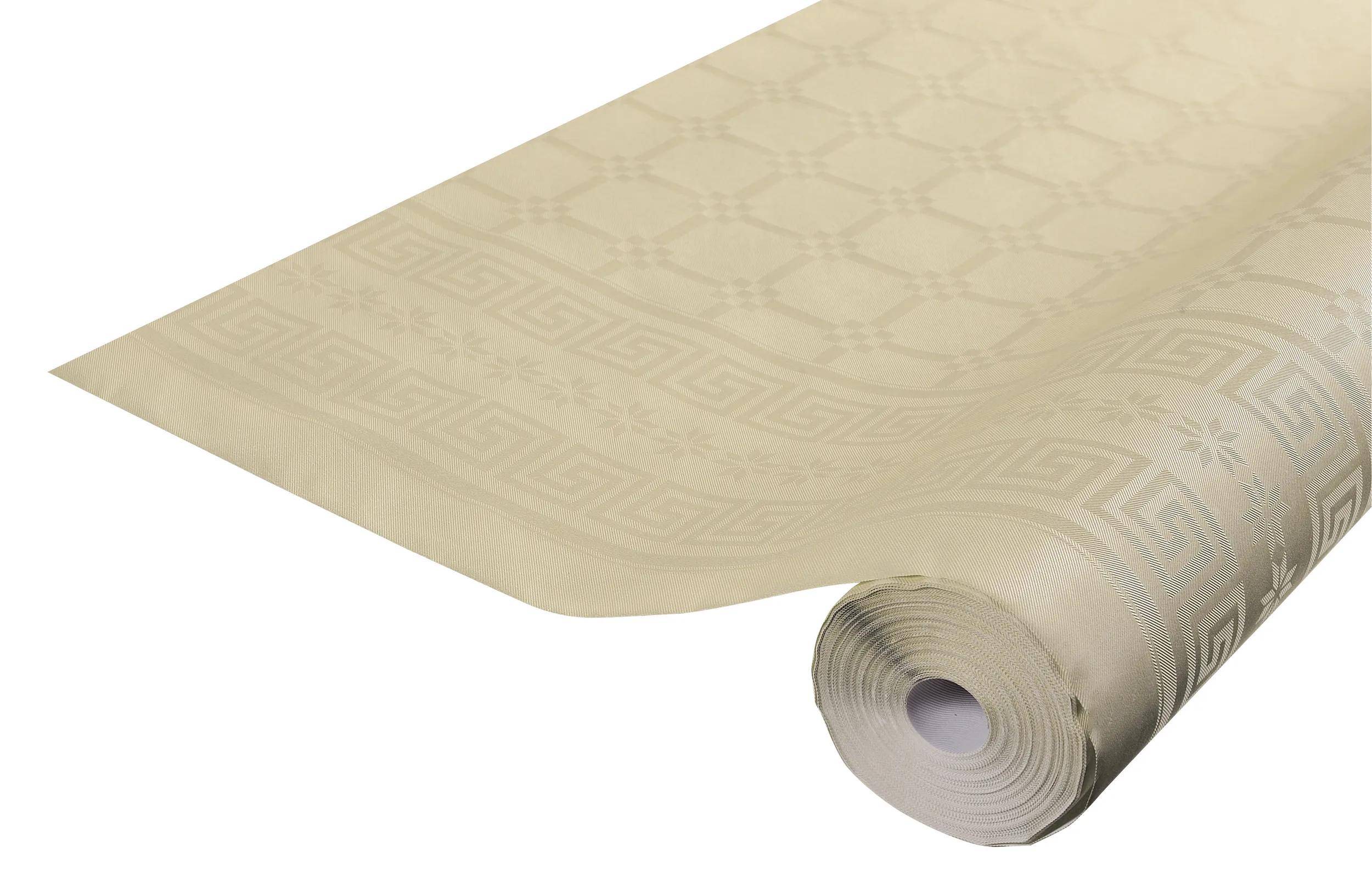 Eine Rolle beigefarbener Tapete mit gemustertem Rand, die symmetrische geometrische Designs aufweist, ist auf einer ebenen Fläche teilweise abgerollt.