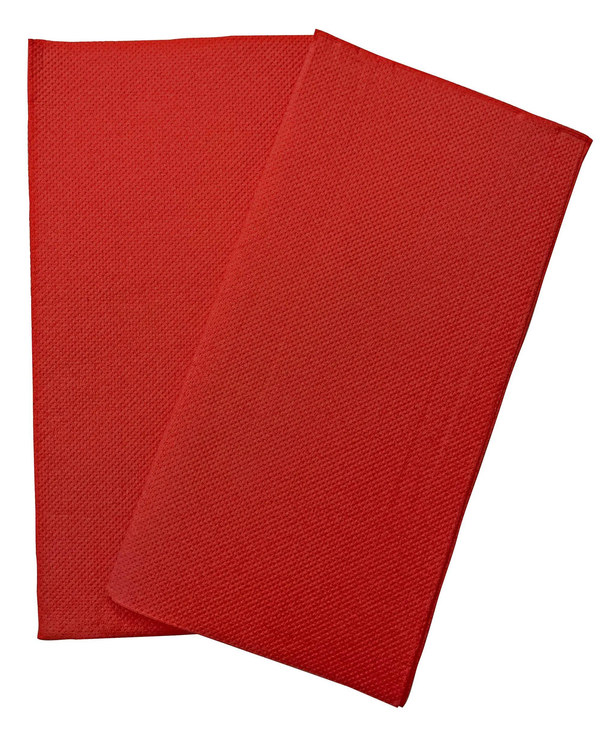 Zwei rote Stoffservietten, eine überlappt die andere.