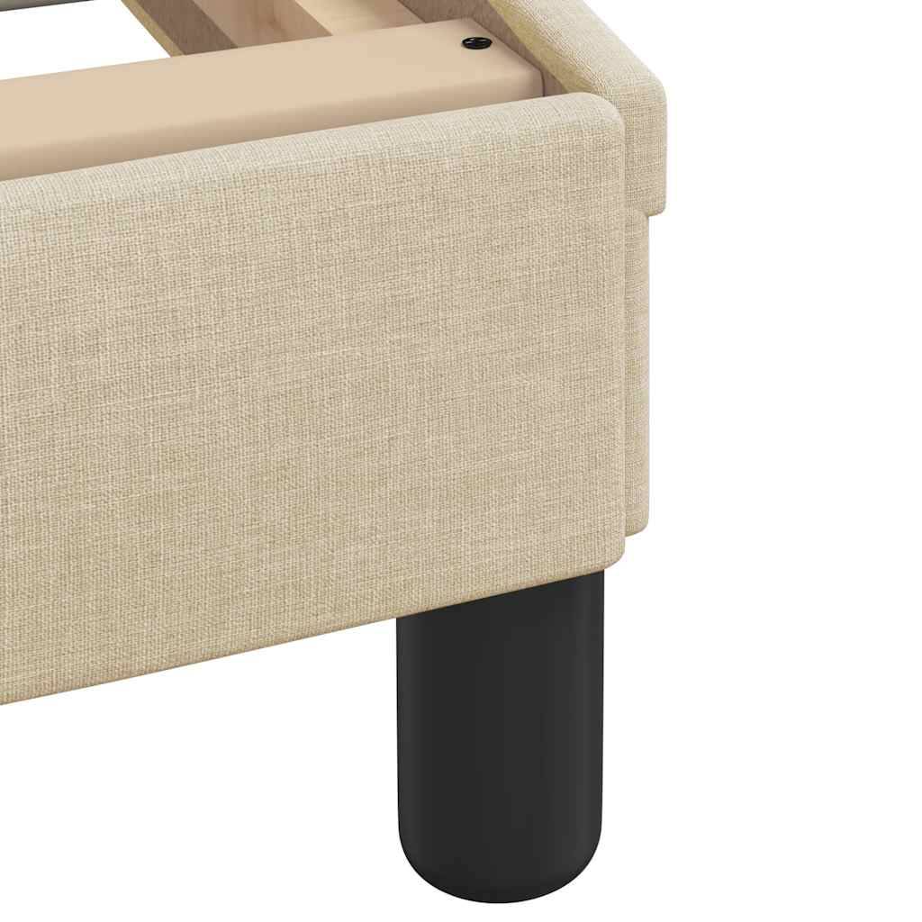 Beige gepolstertes Sofa auf schwarzen Beinen, teilweise sichtbar mit einem Blick auf seinen Holzrahmen, der modernes Design und neutrale Farbgebung betont.