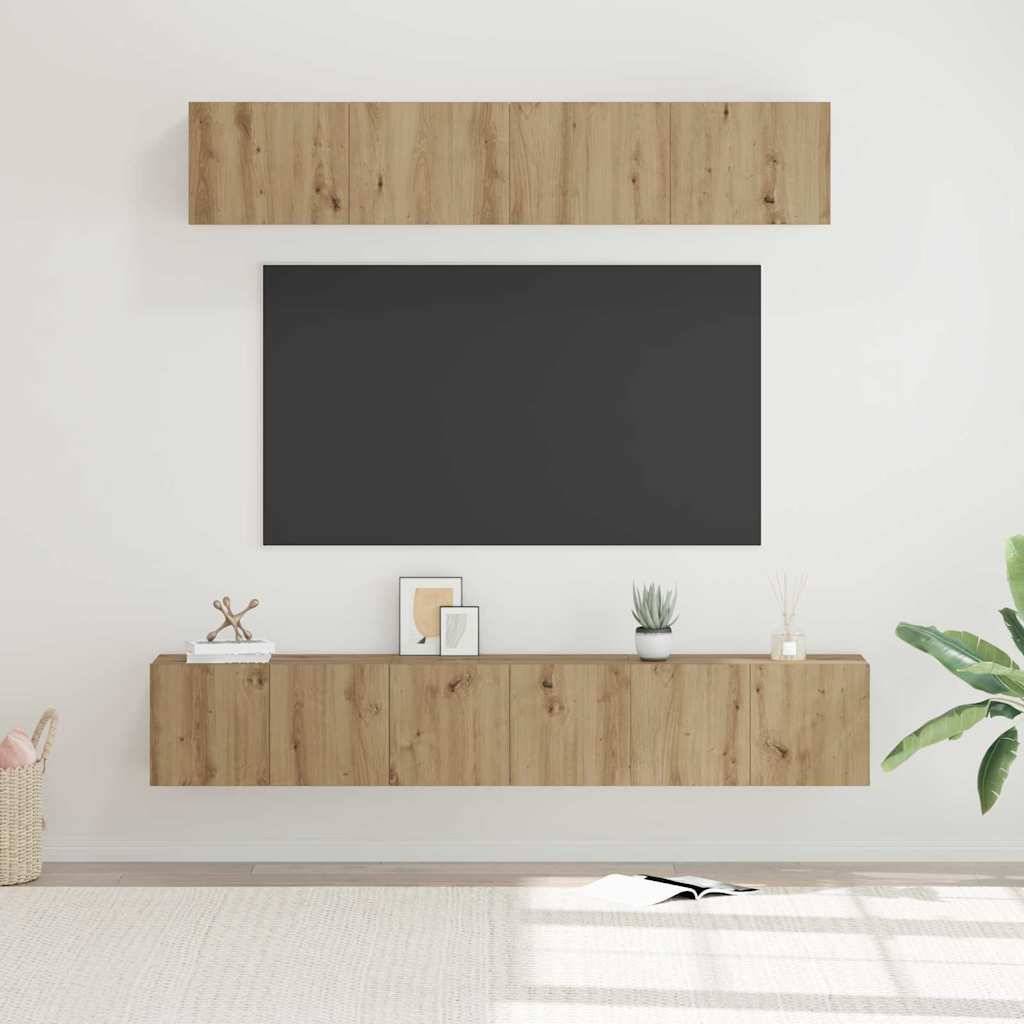 Ein minimalistisches Wohnzimmer zeigt ein an der Wand montiertes Holzregal und Schrankset mit einer schwarzen Platte, einer Topfpflanze und gerahmten Fotos.