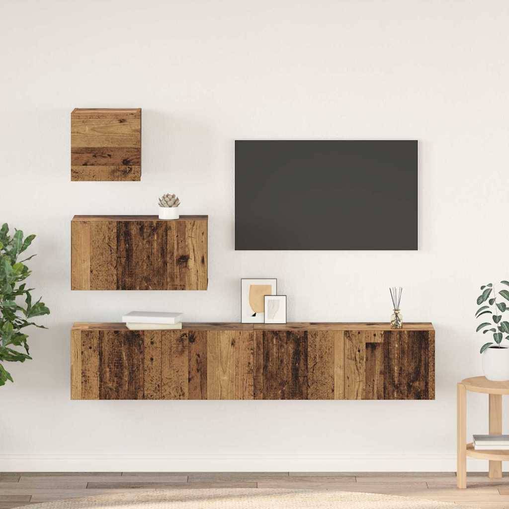 Ein minimalistisches Wohnzimmer mit einer Holz-Wandregaleinheit, einer kleinen Pflanze, gerahmter Kunst und einem montierten Flat-Screen-Fernseher.
