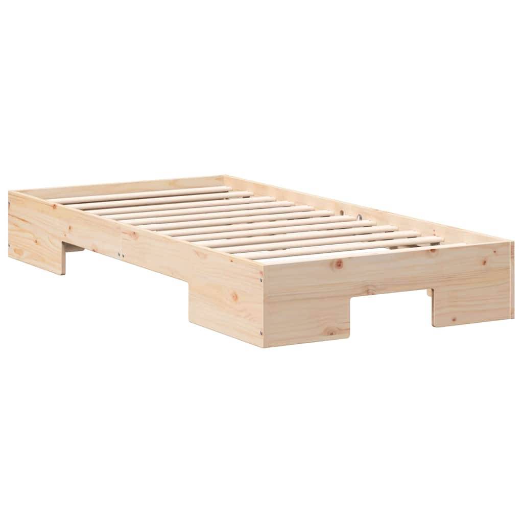 Ein einfacher Holzbettrahmen mit Lattenrost, ohne Kopf- oder Fußteil, geeignet für ein minimalistisches Schlafzimmerdesign.