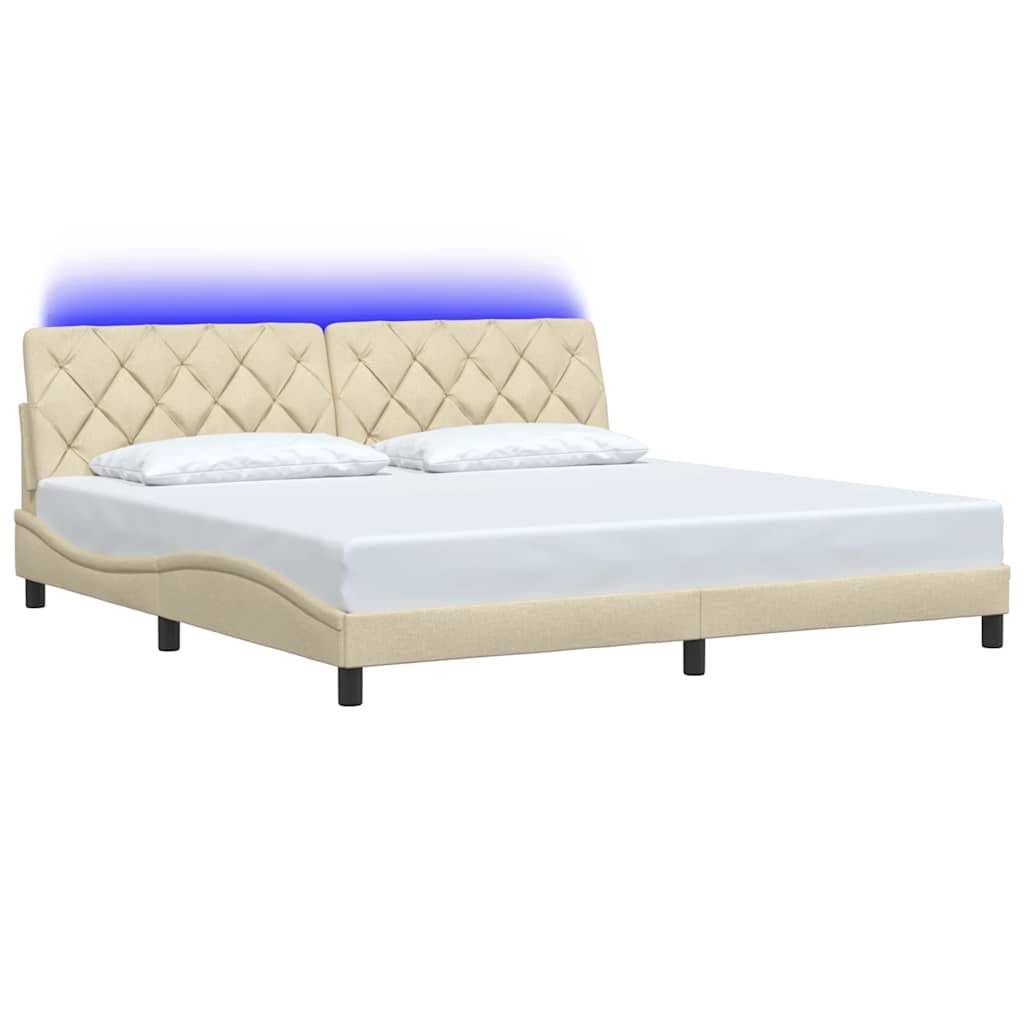 Beige gepolstertes Bettgestell mit rautengestepptem Kopfteil und niedriger Plattformbasis, gezeigt mit Matratze und Kissen auf weißem Hintergrund.