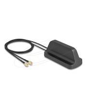 Eine schwarze externe GPS-Antenne mit zwei angeschlossenen Kabeln, die zur Signalempfang und -verstärkung verwendet wird.
