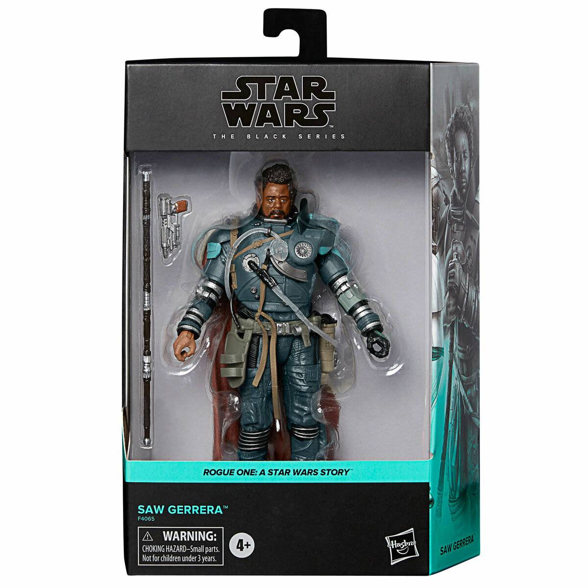 Star Wars The Black Series Saw Gerrera Actionfigur in einer Schachtelverpackung mit Waffenzubehör und 'Rogue One: A Star Wars Story' Etikett.