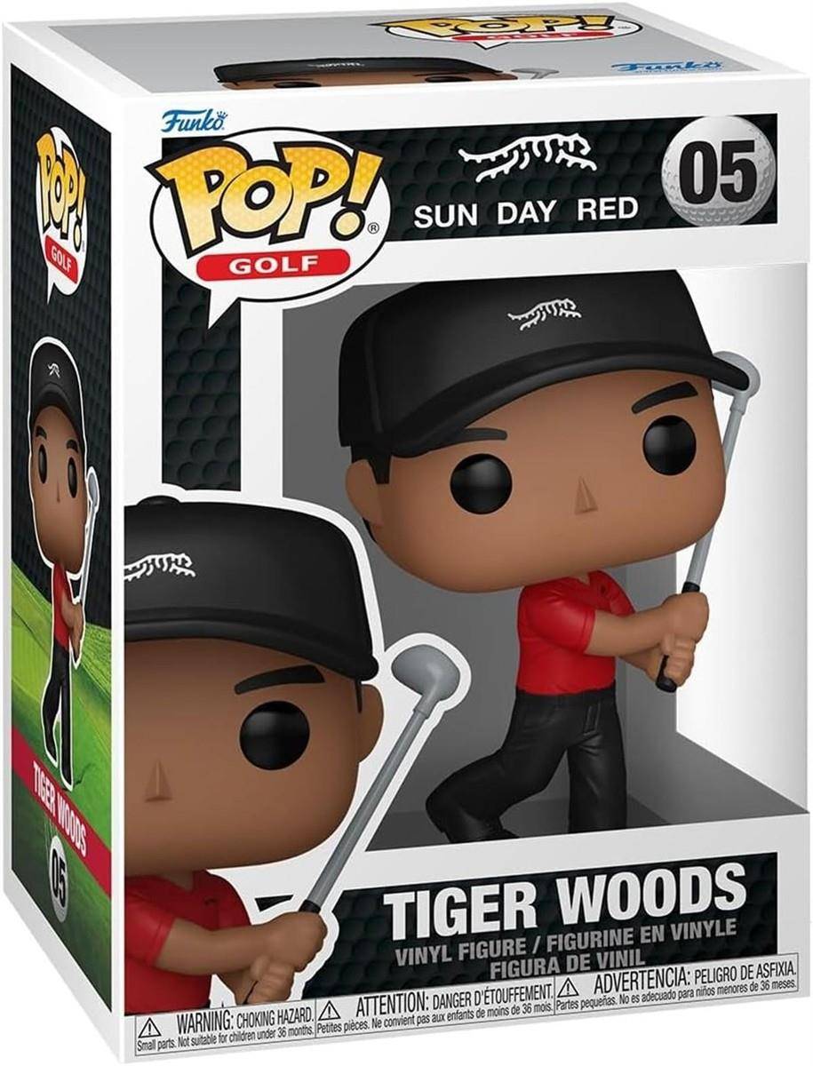 Funko Pop! Golf Tiger Woods Vinyl-Figur in einer Anzeigebeschreibung, die ihn in einem roten Hemd und schwarzer Kappe zeigt, wie er einen Golfschläger hält.