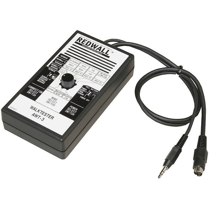 Ein rechteckiges elektronisches Gerät mit der Beschriftung 'Redwall Walktester AWT-3', das verschiedene Schalter, einen zentralen Drehknopf und ein angeschlossenes Kabel mit zwei Steckern aufweist.