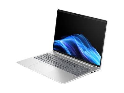 Ein silberner Laptop mit sichtbarer Tastatur und Touchpad zeigt eine blaue Wellengrafik auf seinem Bildschirm, leicht nach rechts geneigt.