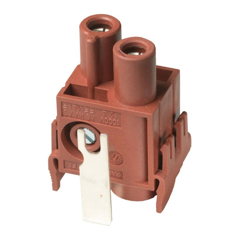 Eine braune elektrische Komponente mit zwei zylindrischen Anschlüssen und einer Metalllasche an der Seite. Sie hat Markierungen, die Spannung und Stromstärke angeben.