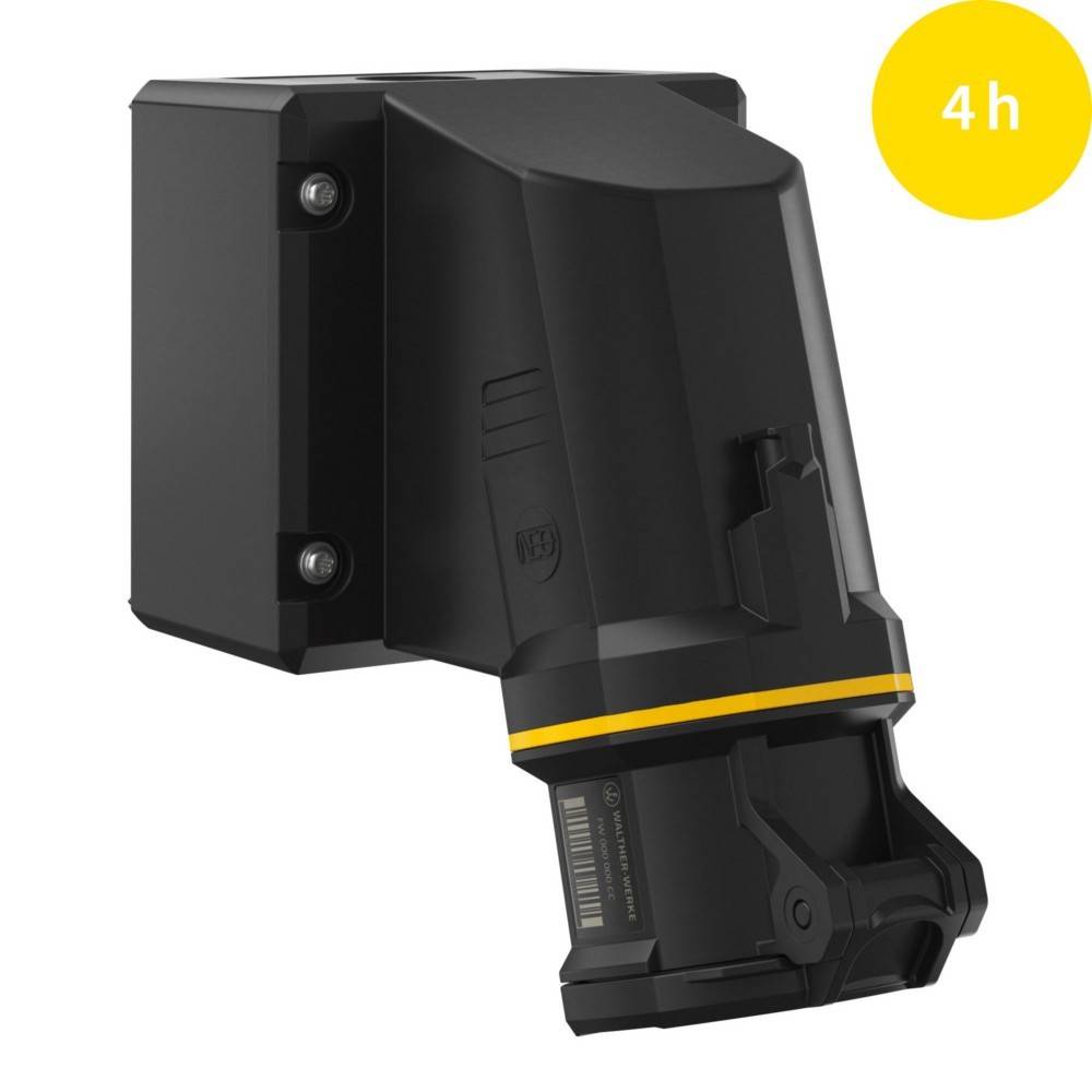 Ein schwarzer und gelber industrieller Ladegerät, der an einer Wand montiert ist, mit einer kleinen Anzeige in der oberen rechten Ecke, die '4h' zeigt und die verbleibende Ladezeit angibt.