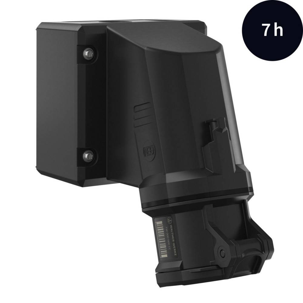 Schwarzes, an der Wand montiertes Gerät mit einer digitalen Anzeige, die ‚7h' in Weiß auf einem blauen Kreis zeigt, möglicherweise eine verbleibende Zeit anzeigend.