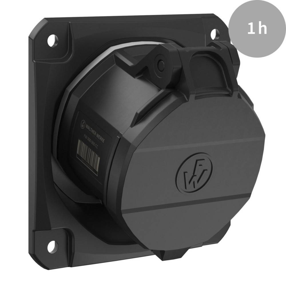 Nahaufnahme einer schwarzen Steckdose, die auf einer quadratischen Platte mit vier Befestigungslöchern montiert ist und eine kreisförmige Steckerblende mit der Beschriftung '1h' aufweist.
