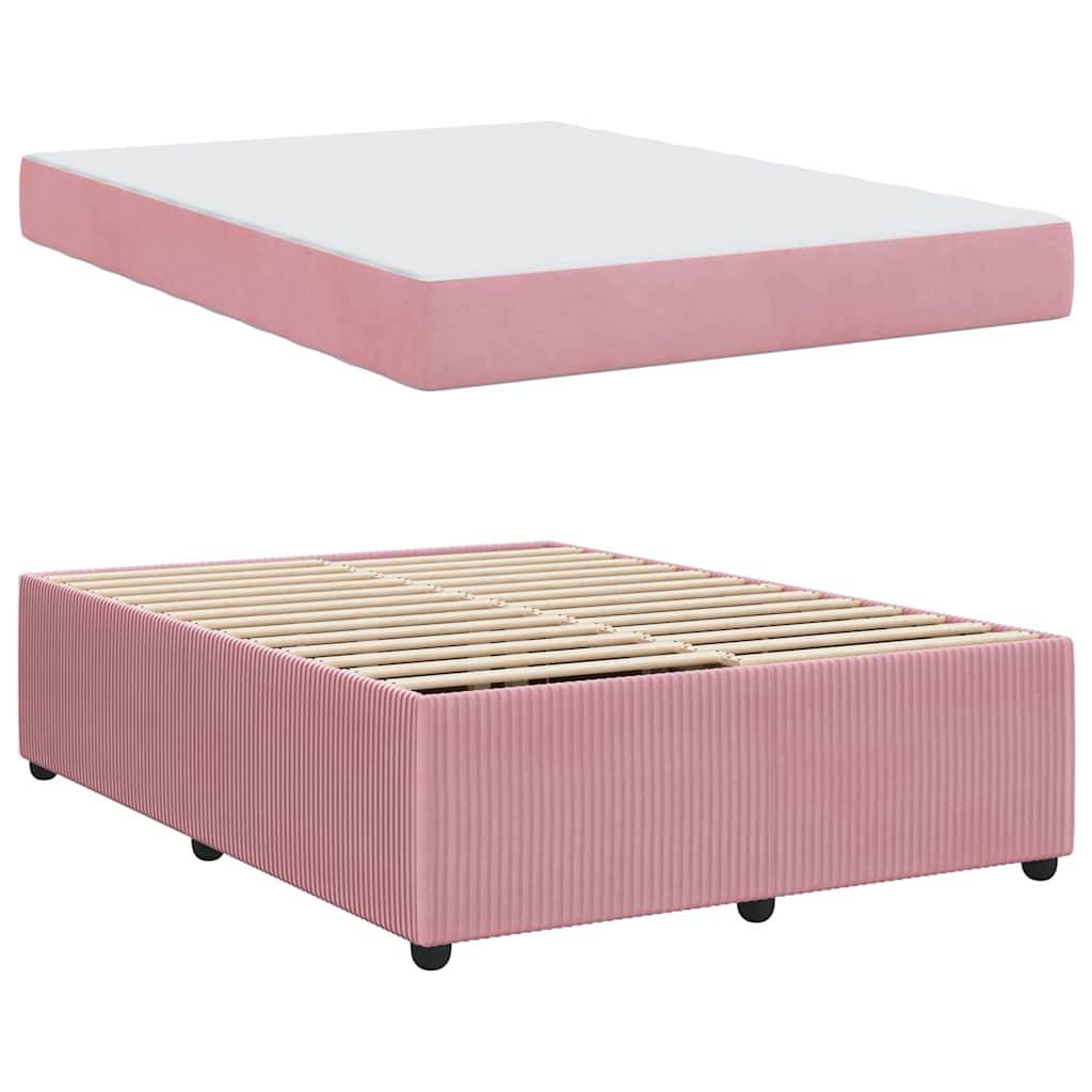 Eine rosa gepolsterte Bettunterkonstruktion mit Latten ist unterhalb einer passenden rosa gepolsterten Matratzenunterlage zu sehen.