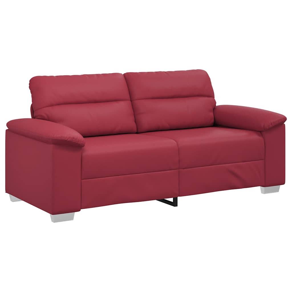 Rotes Ledersofa mit weichen Kissen, breiten Armlehnen und modernem Design auf weißem Hintergrund.