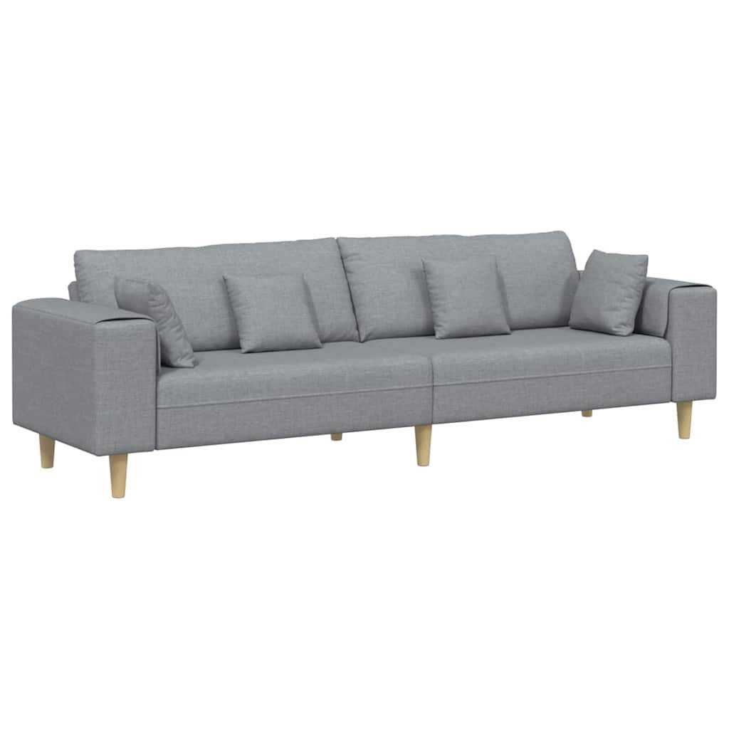 Ein modernes graues Sofa mit fünf passenden Kissen, das ein minimalistisches Design und Holzbeine aufweist.