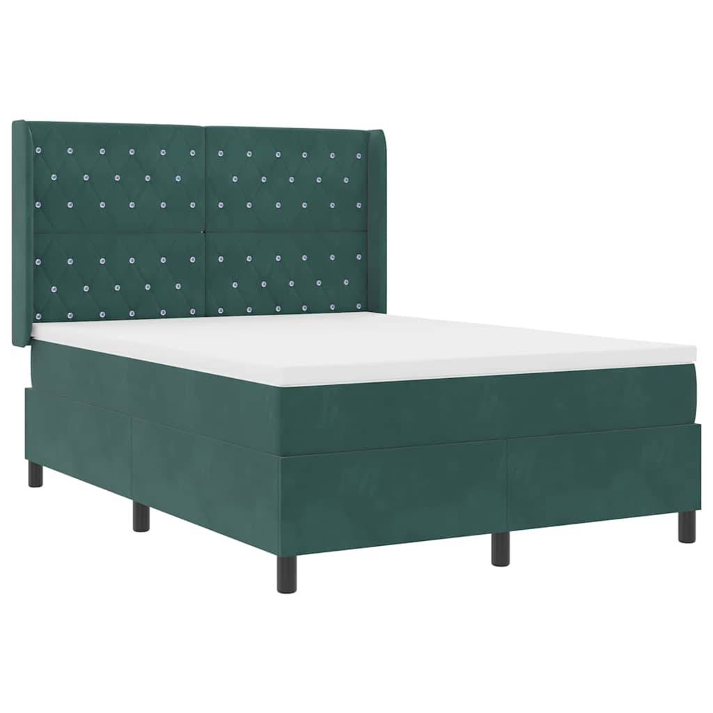 Eleganter grün gepolsterter Bettrahmen mit diamantgestepptem Kopfteil, getragen von schwarzen Beinen, der ein modernes und luxuriöses Design präsentiert.